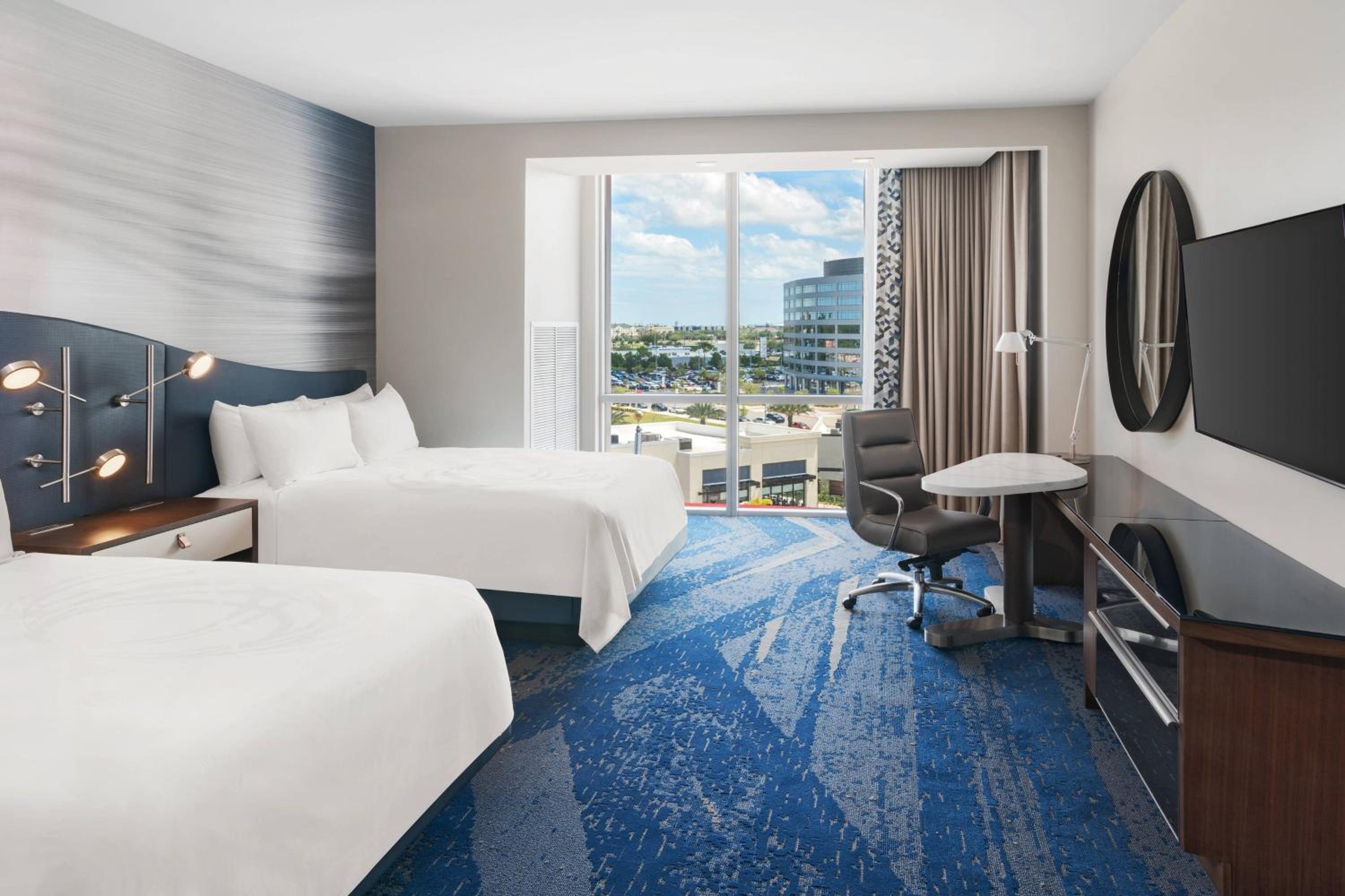Queen Room with Two Queen Beds - Hearing Accessible - Photo 1