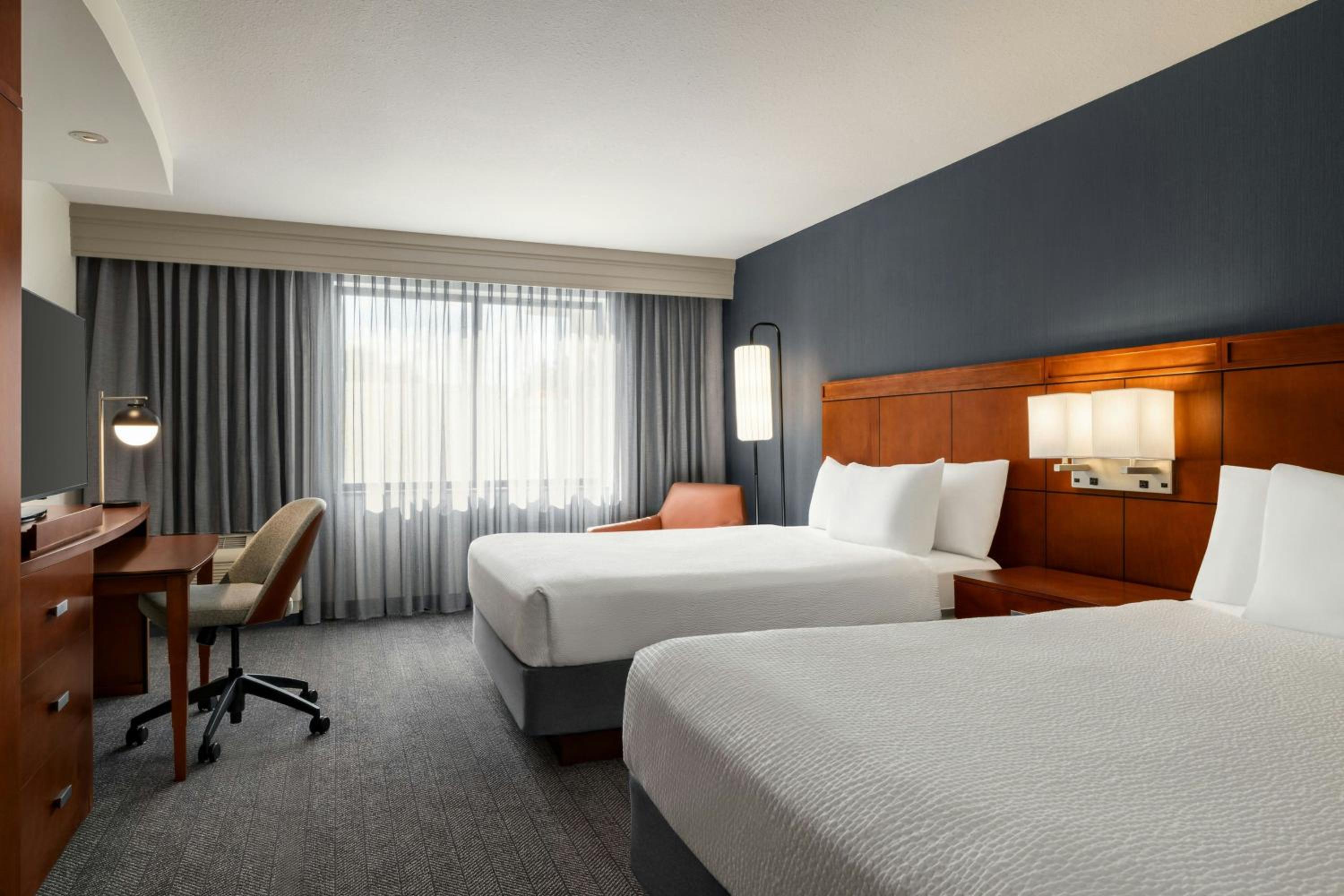 Queen Room with Two Queen Beds - Photo 1