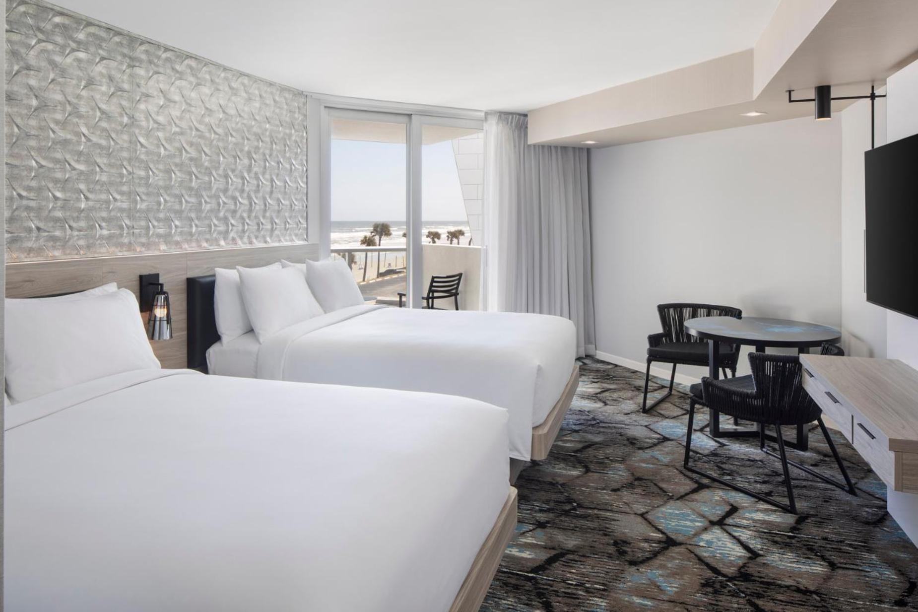 Queen Room with Two Queen Beds, Sofa Bed and City View