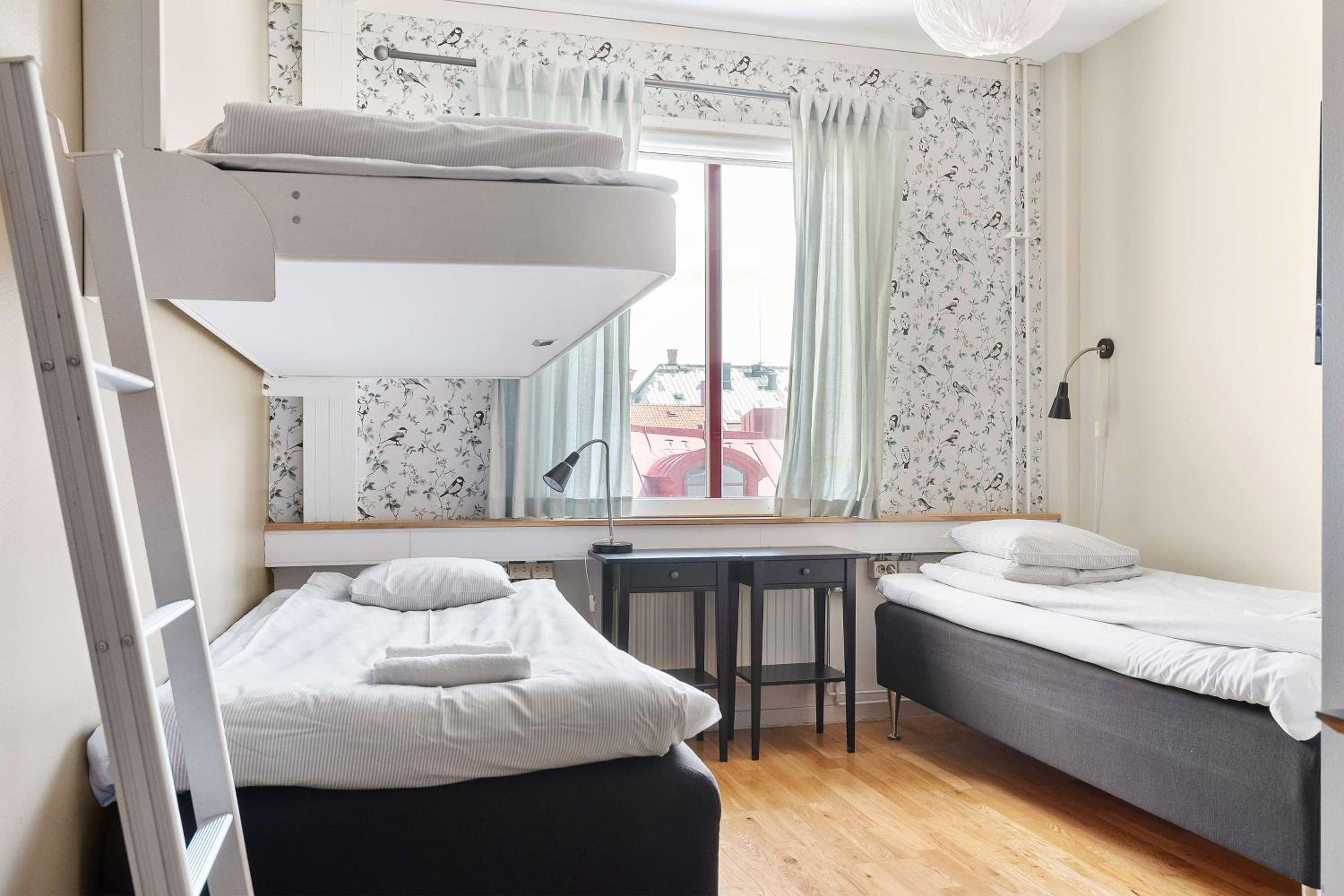 Standard Twin Room with Two Single Bed and One Single Wall Bed - Non-Smoking