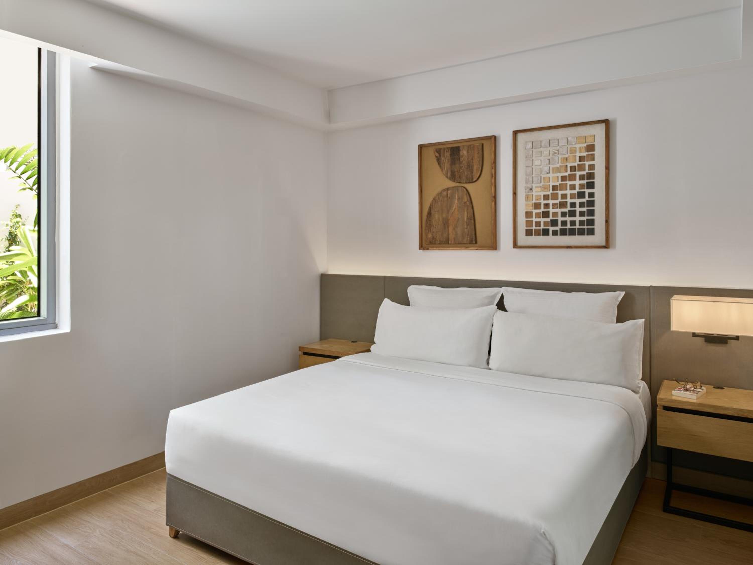 Two-Bedroom King Suite with Two Twin Beds and Garden View