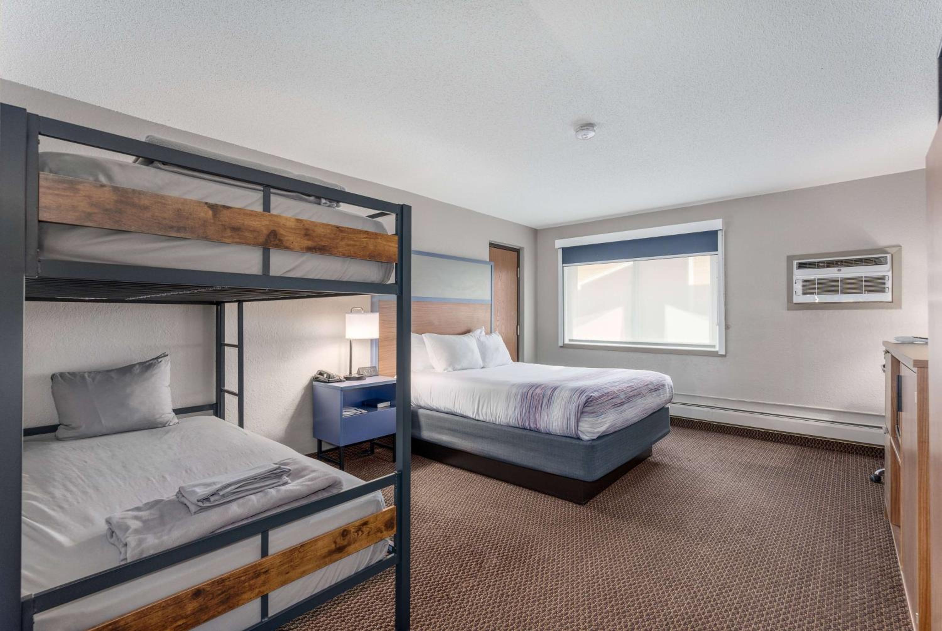 Queen Room with One Queen Bed and One Single Bunk Bed - Non-Smoking - Photo 1
