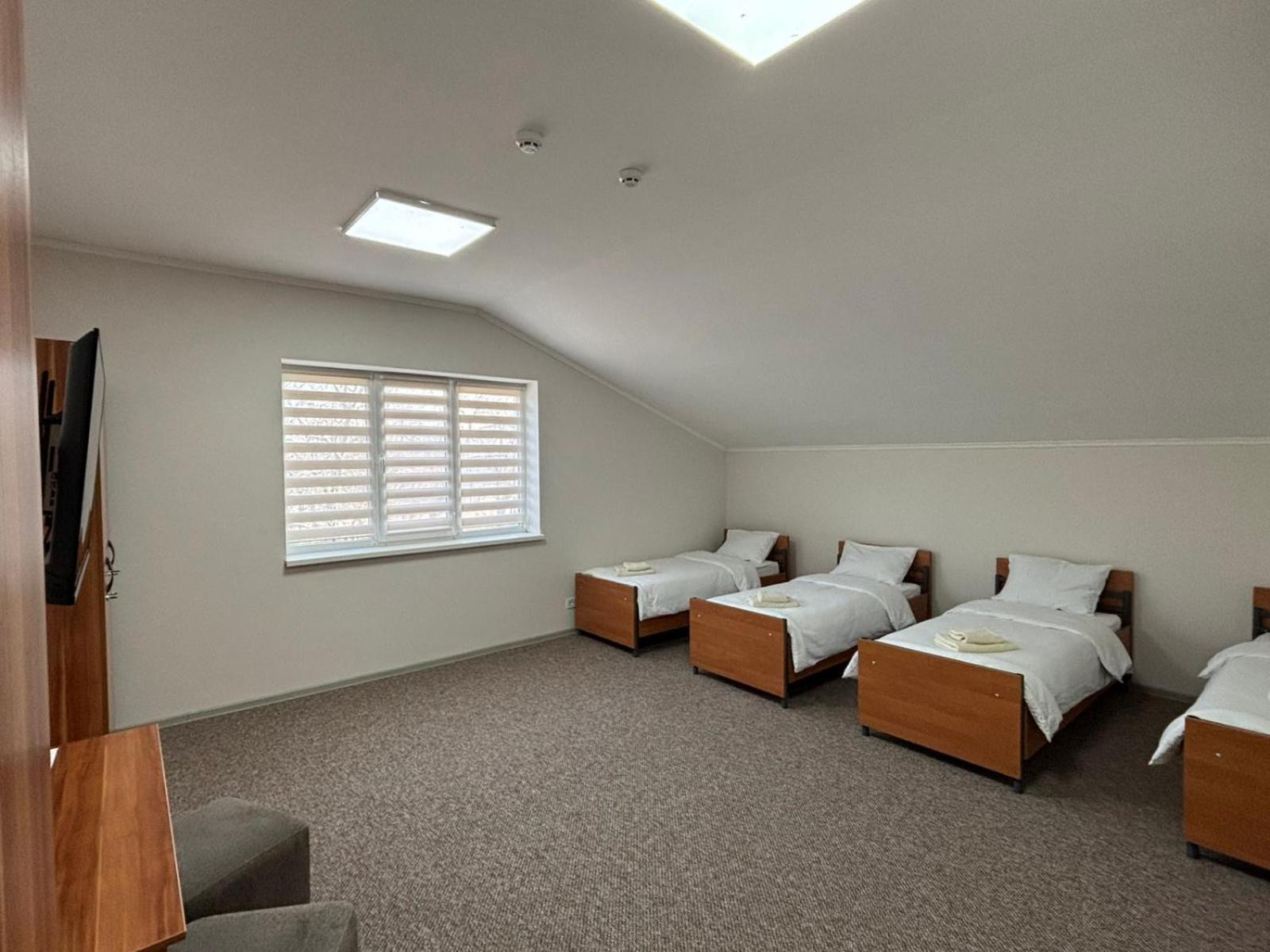 Quadruple Room with Shared Bathroom