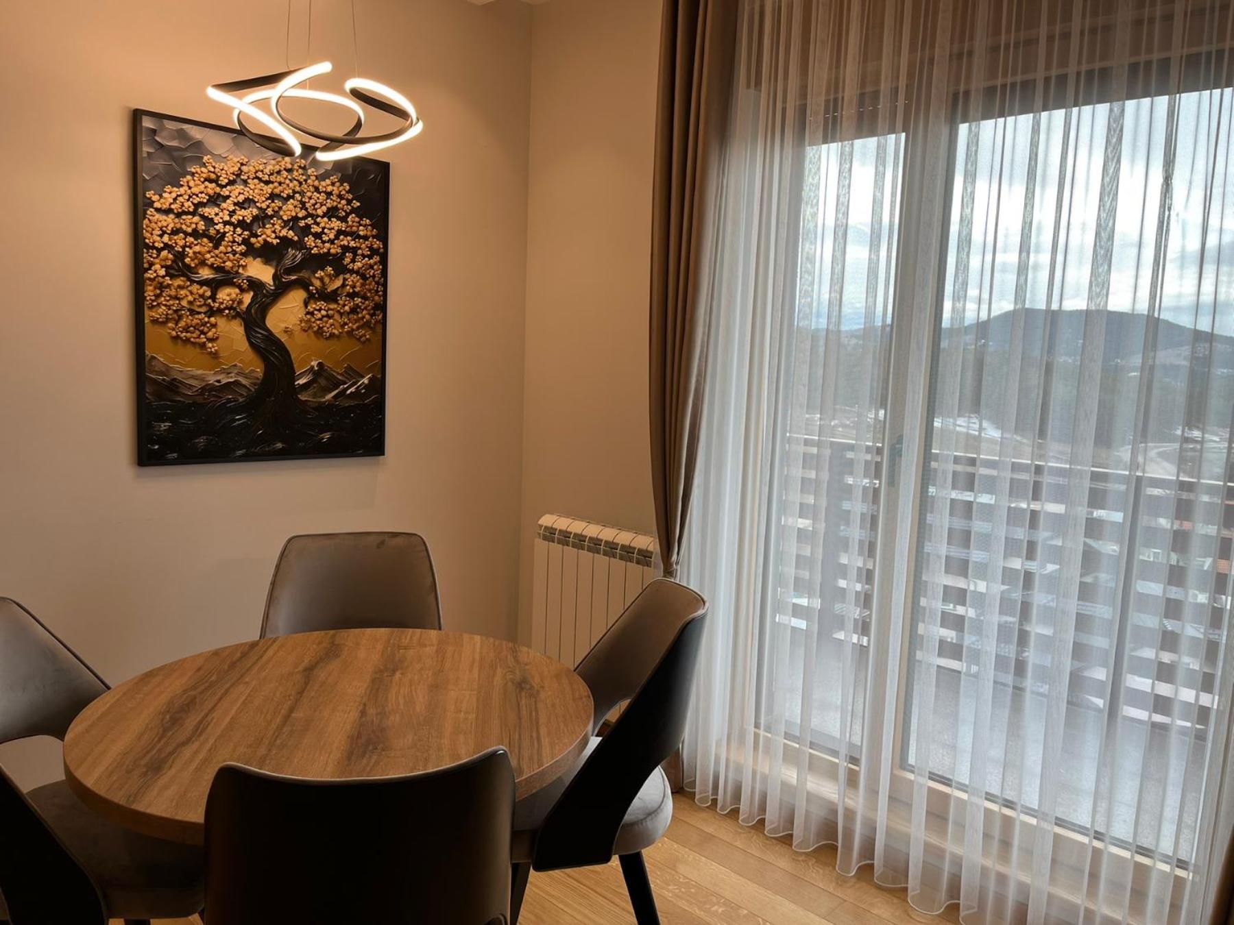 One-Bedroom Apartment with Balcony and Mountain View