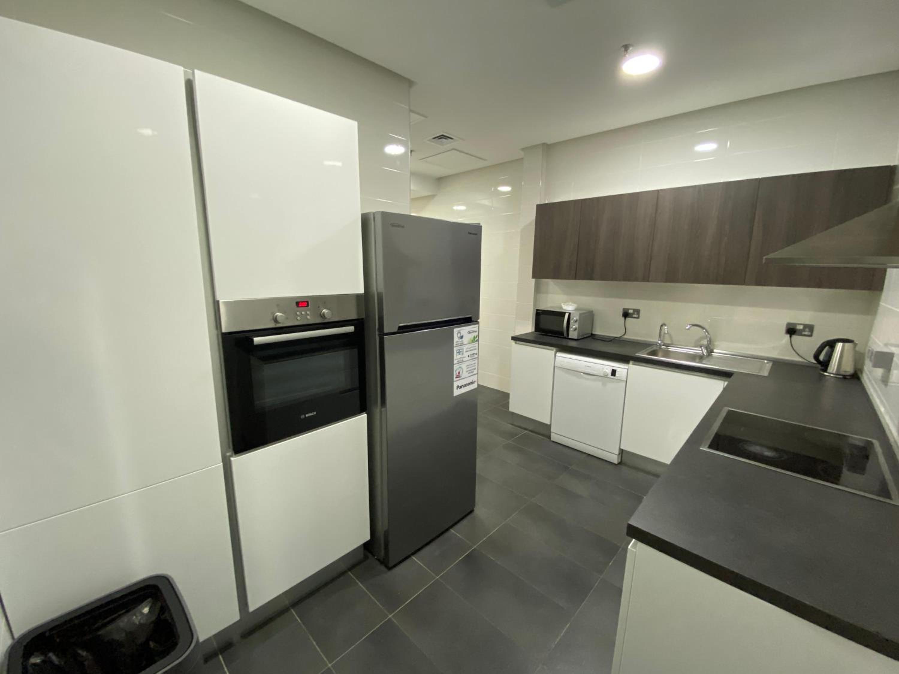 Deluxe Family Suite - Photo 10