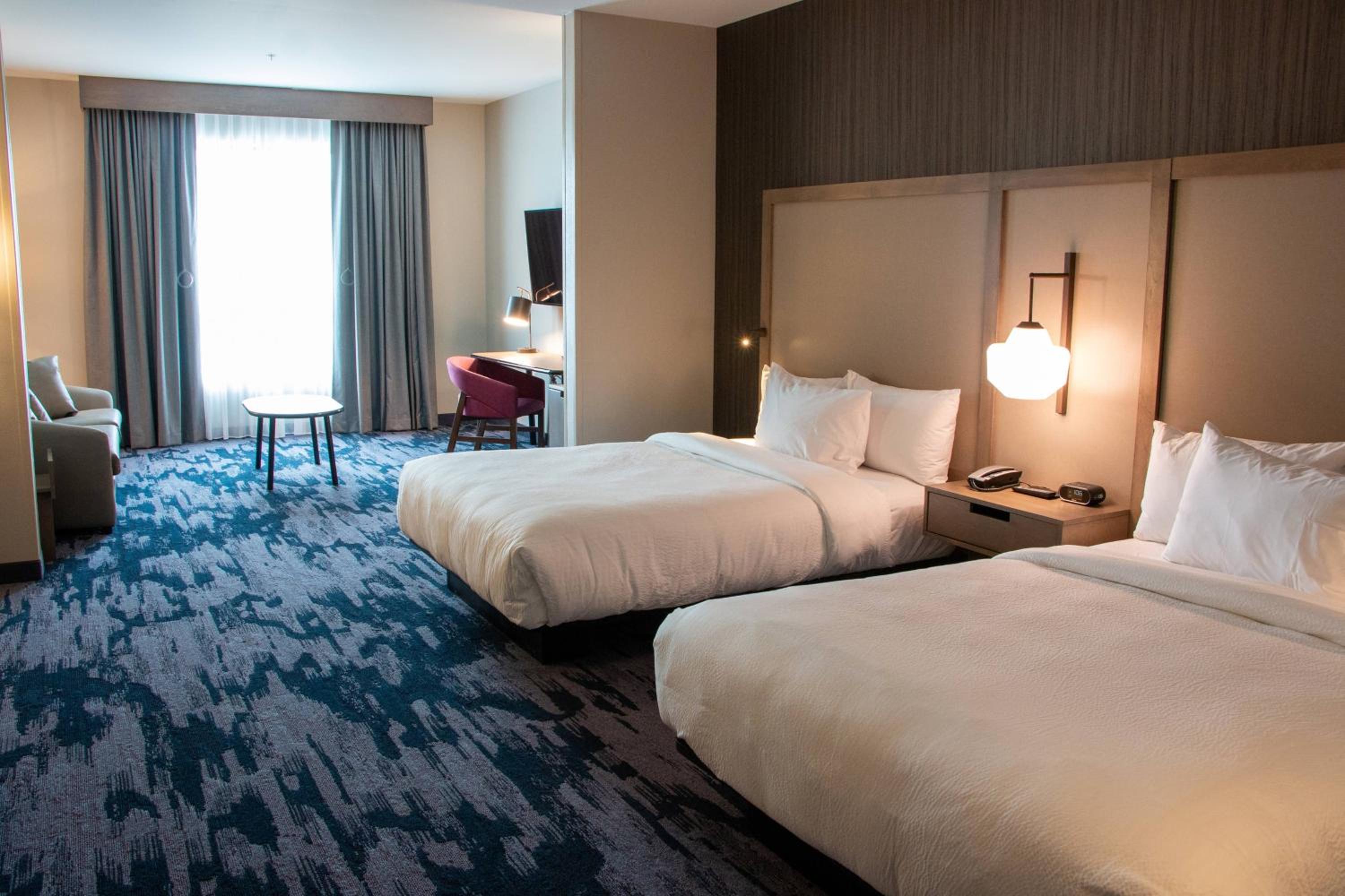 Queen Suite with Two Queen Beds and Sofa Bed