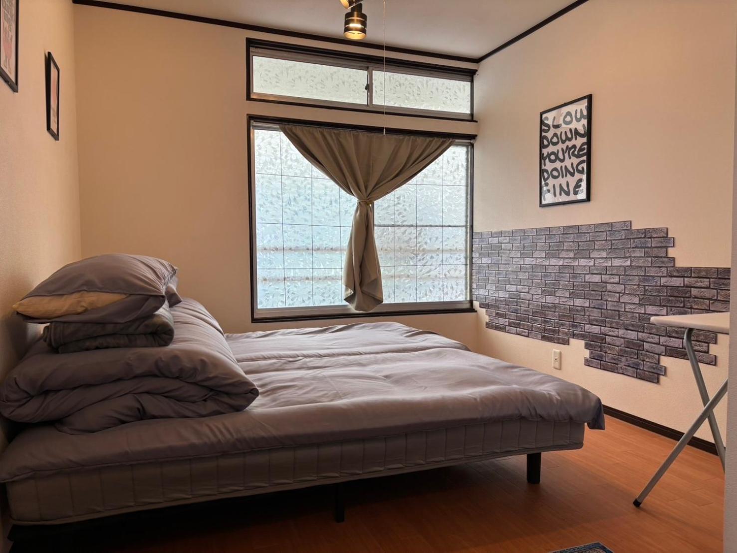 Economy Triple Room with Shared Bathroom photo 2