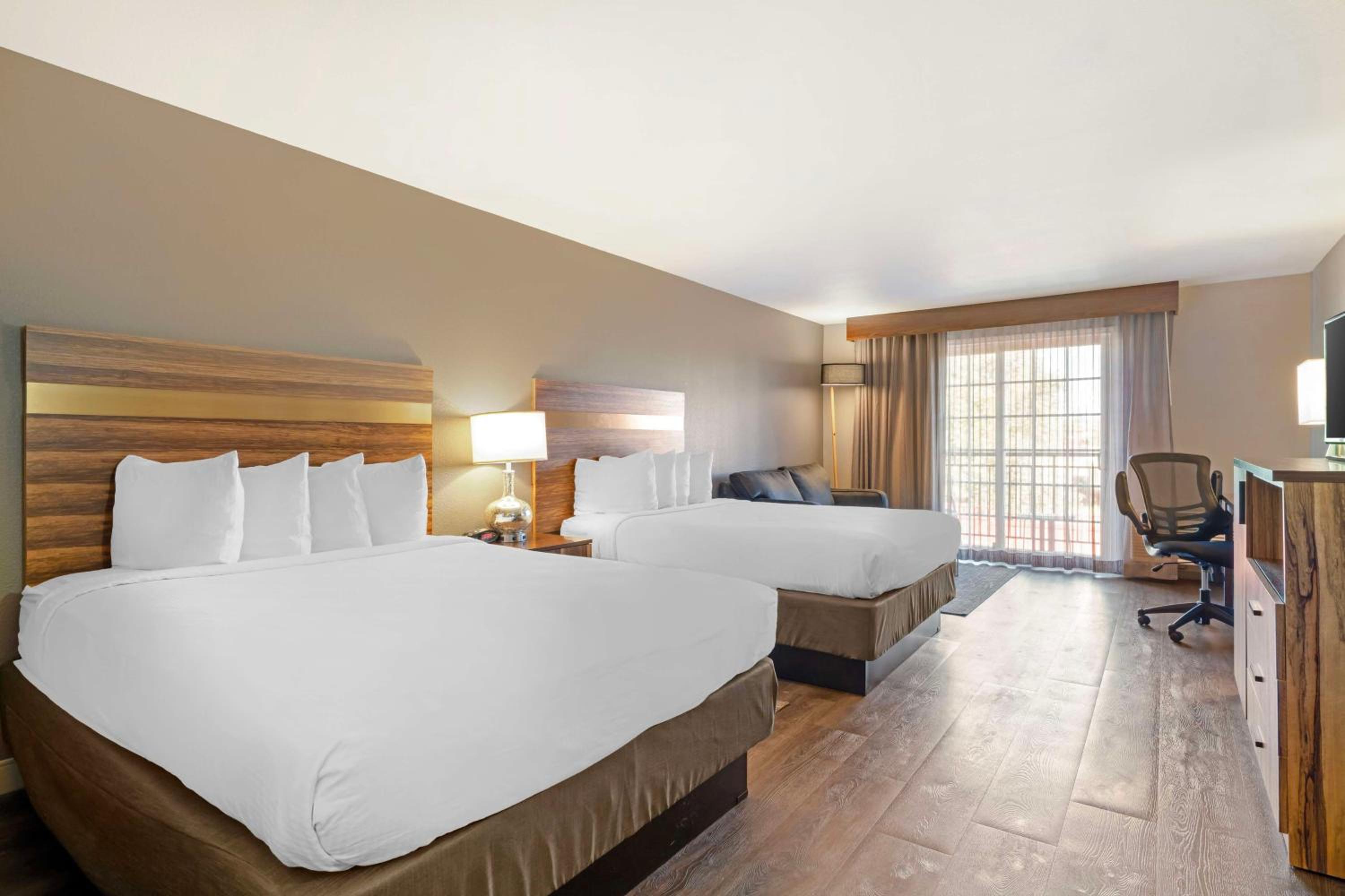 Queen Room with Two Queen Beds and Sofa Bed - Photo 1