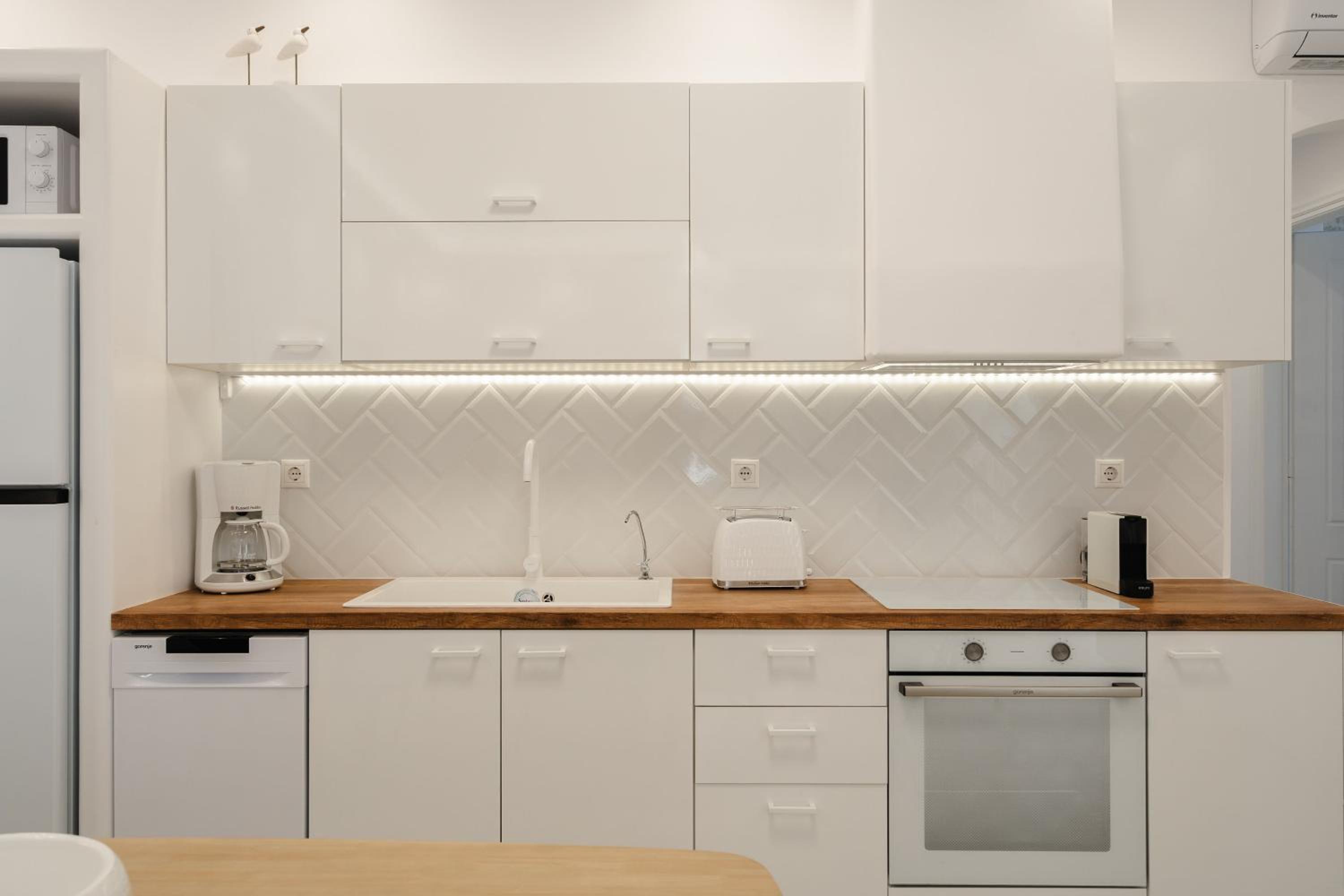 Three-Bedroom Apartment - Photo 12