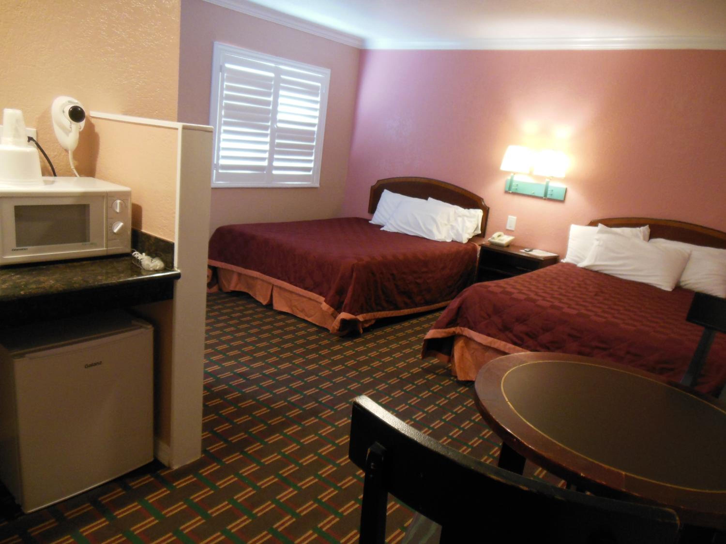 Queen Room with Two Queen Beds - Photo 1
