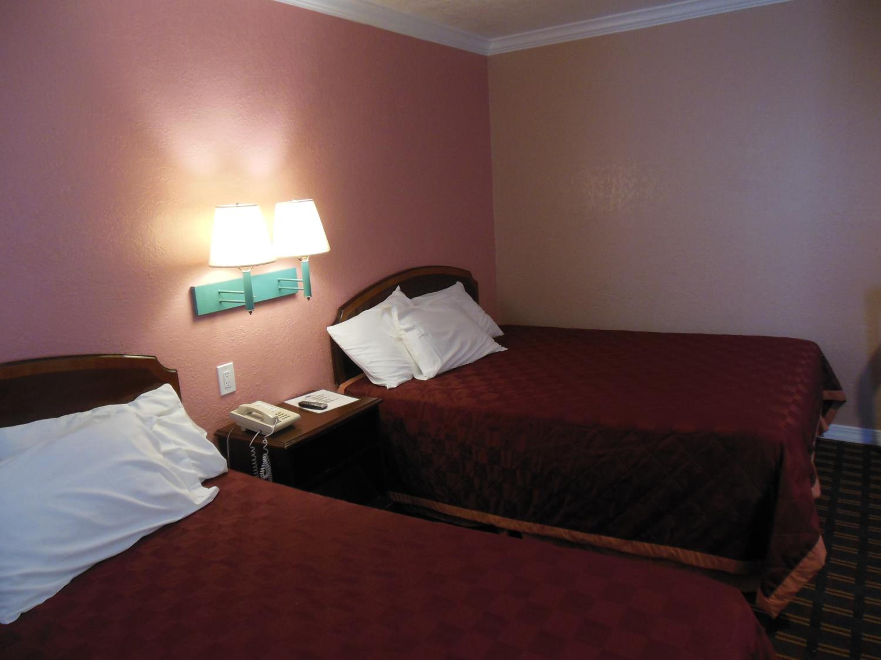 Queen Room with Two Queen Beds - Photo 9