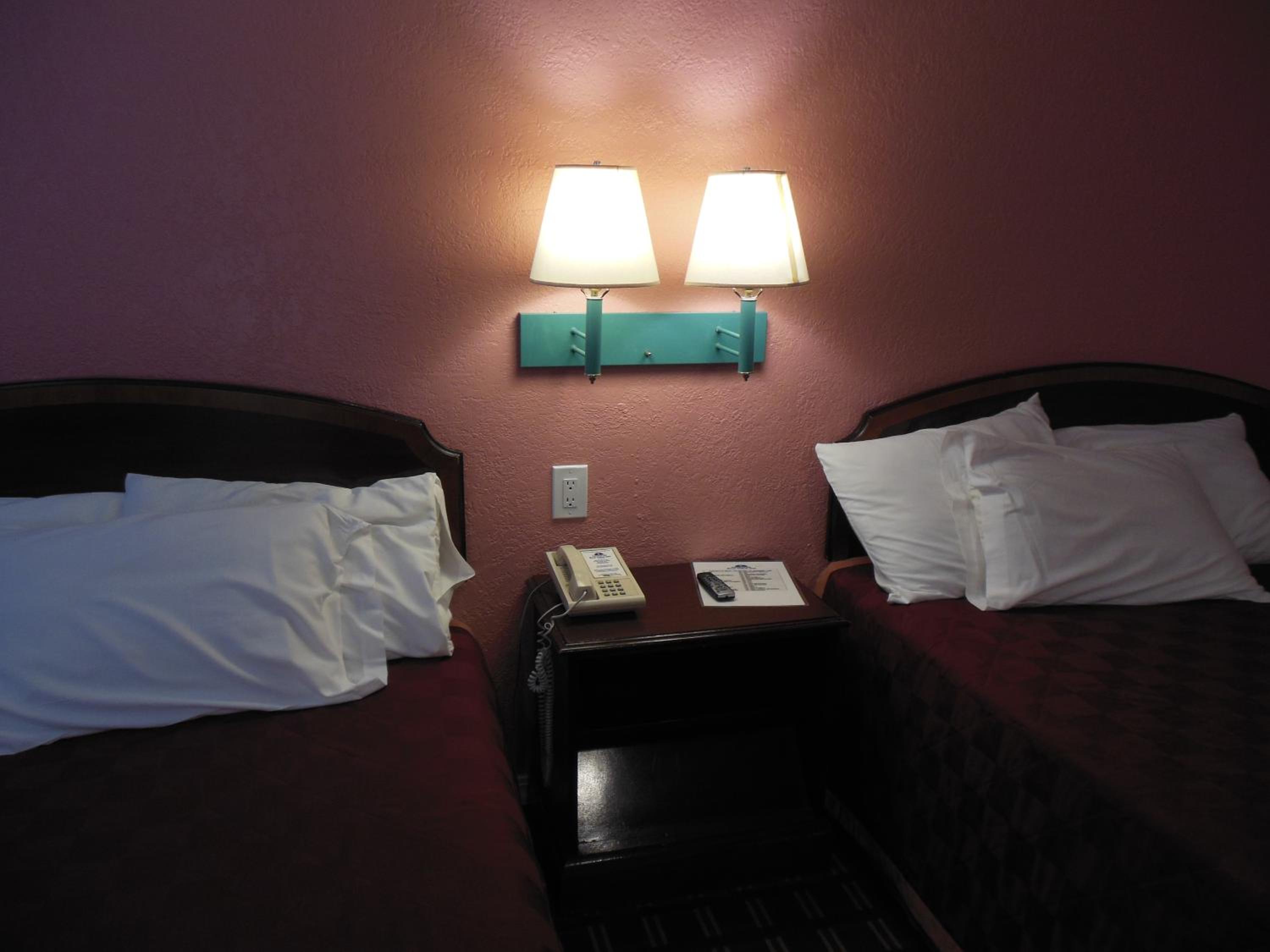 Queen Room with Two Queen Beds - Photo 10