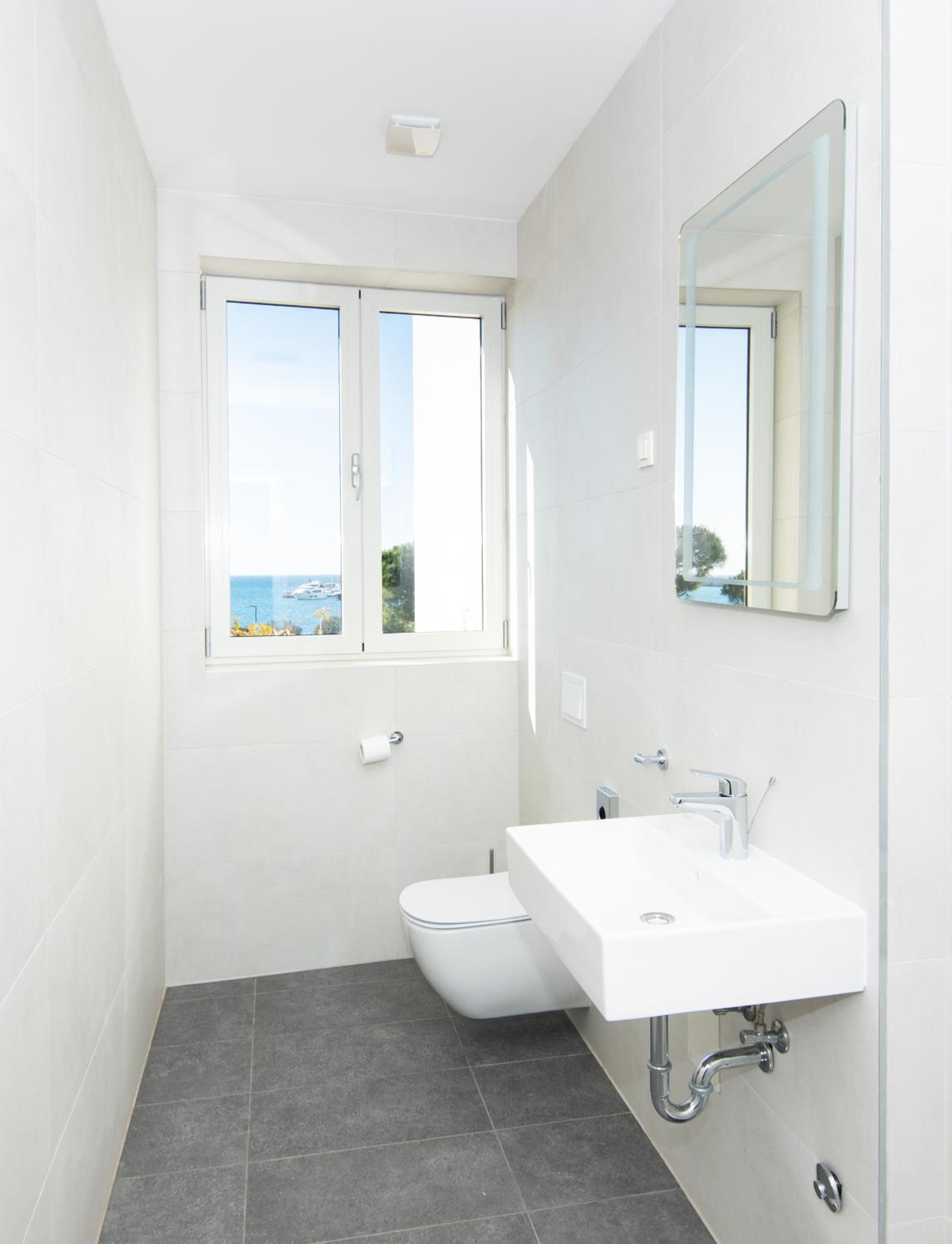 Three-Bedroom Apartment with Sea View