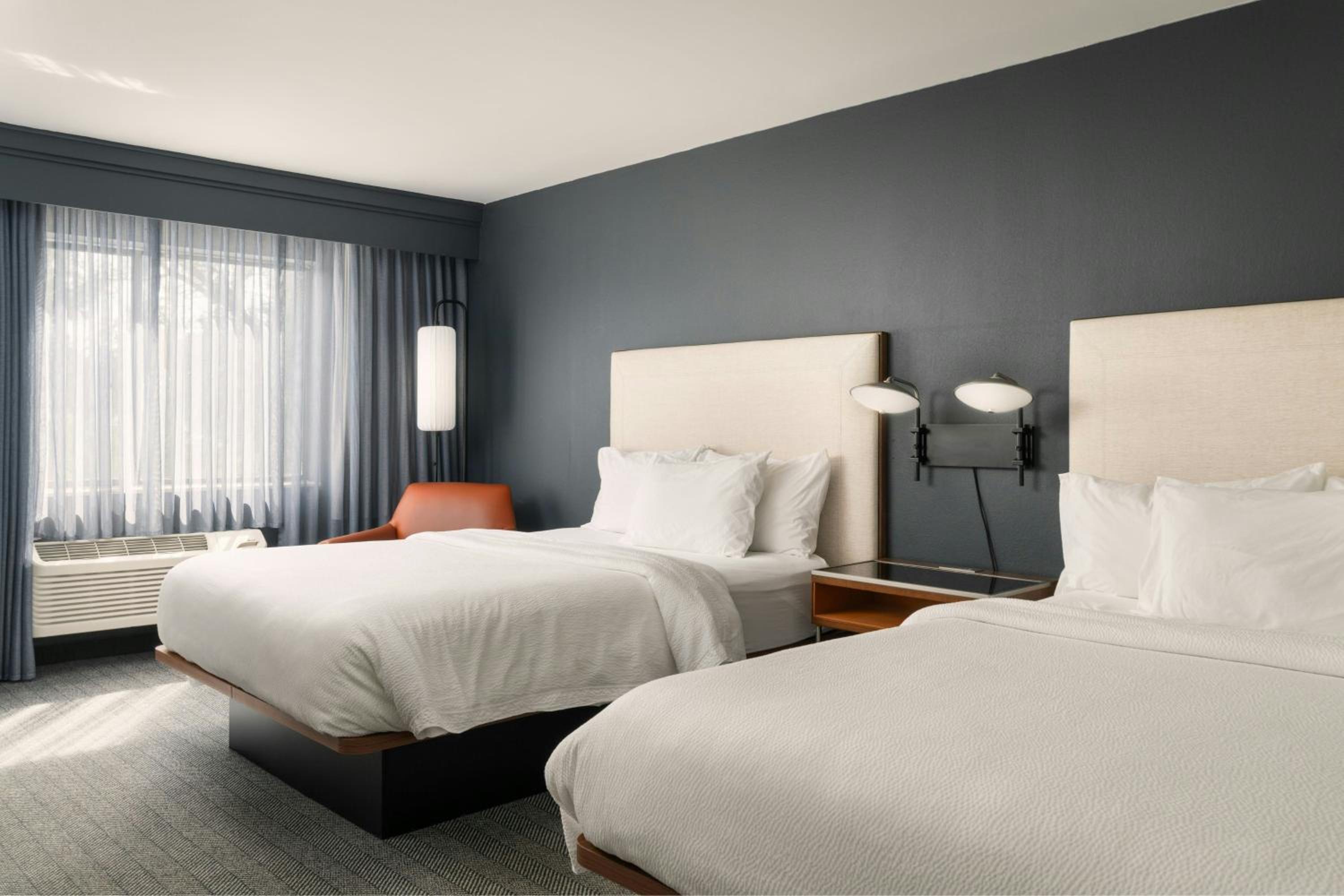 Queen Room with Two Queen Beds and Sofa Bed