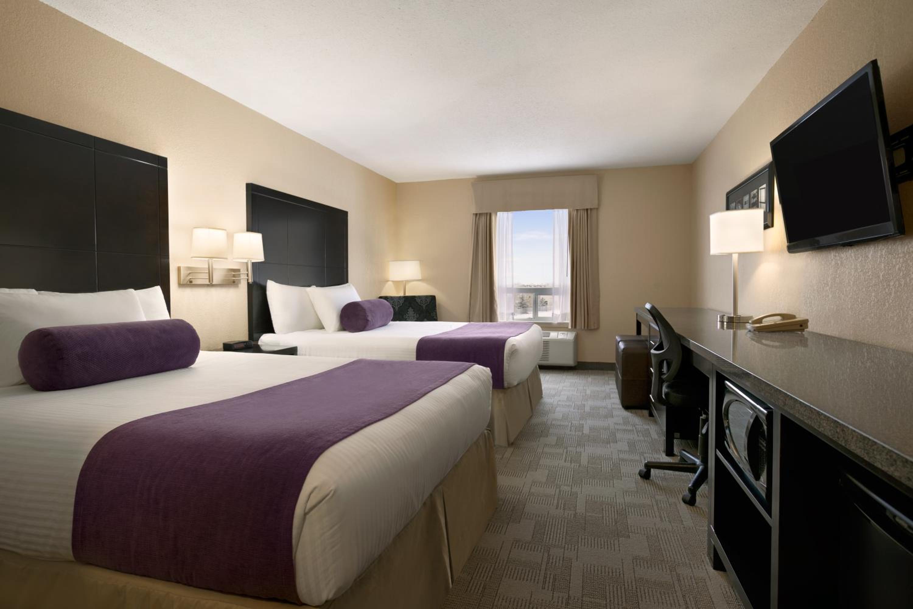 Queen Room with Two Queen Beds - Non-Smoking - Photo 1