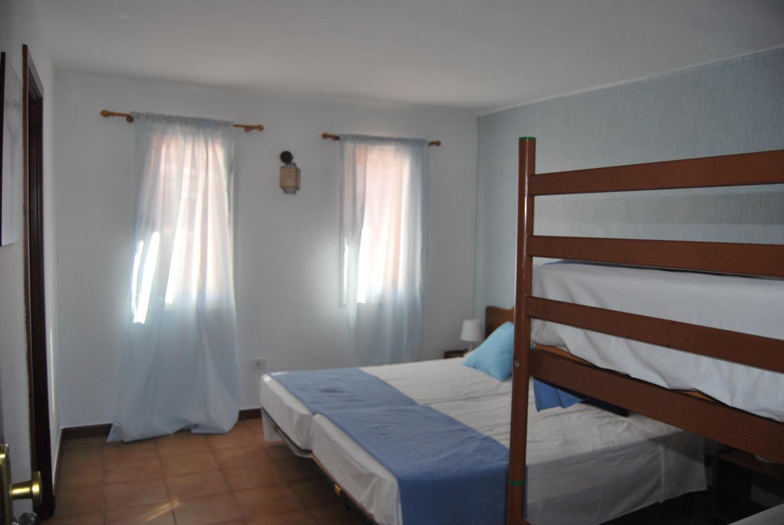 Habitación Cuádruple con Baño Privado