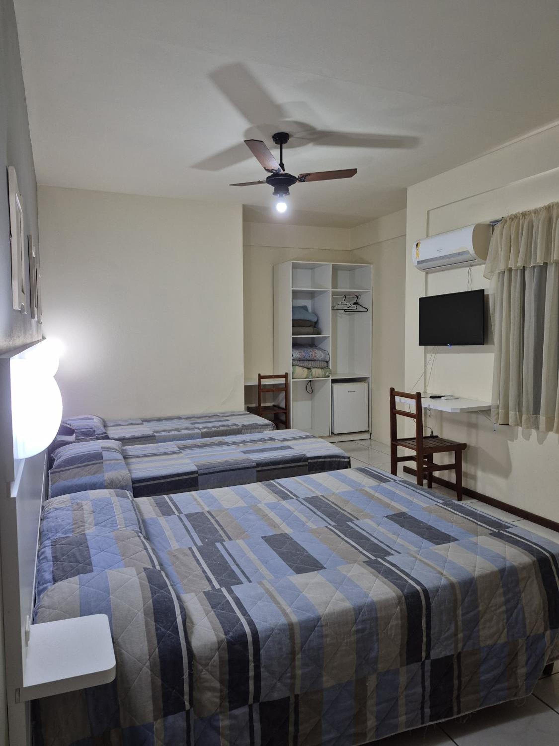 Economy Triple Room photo 2