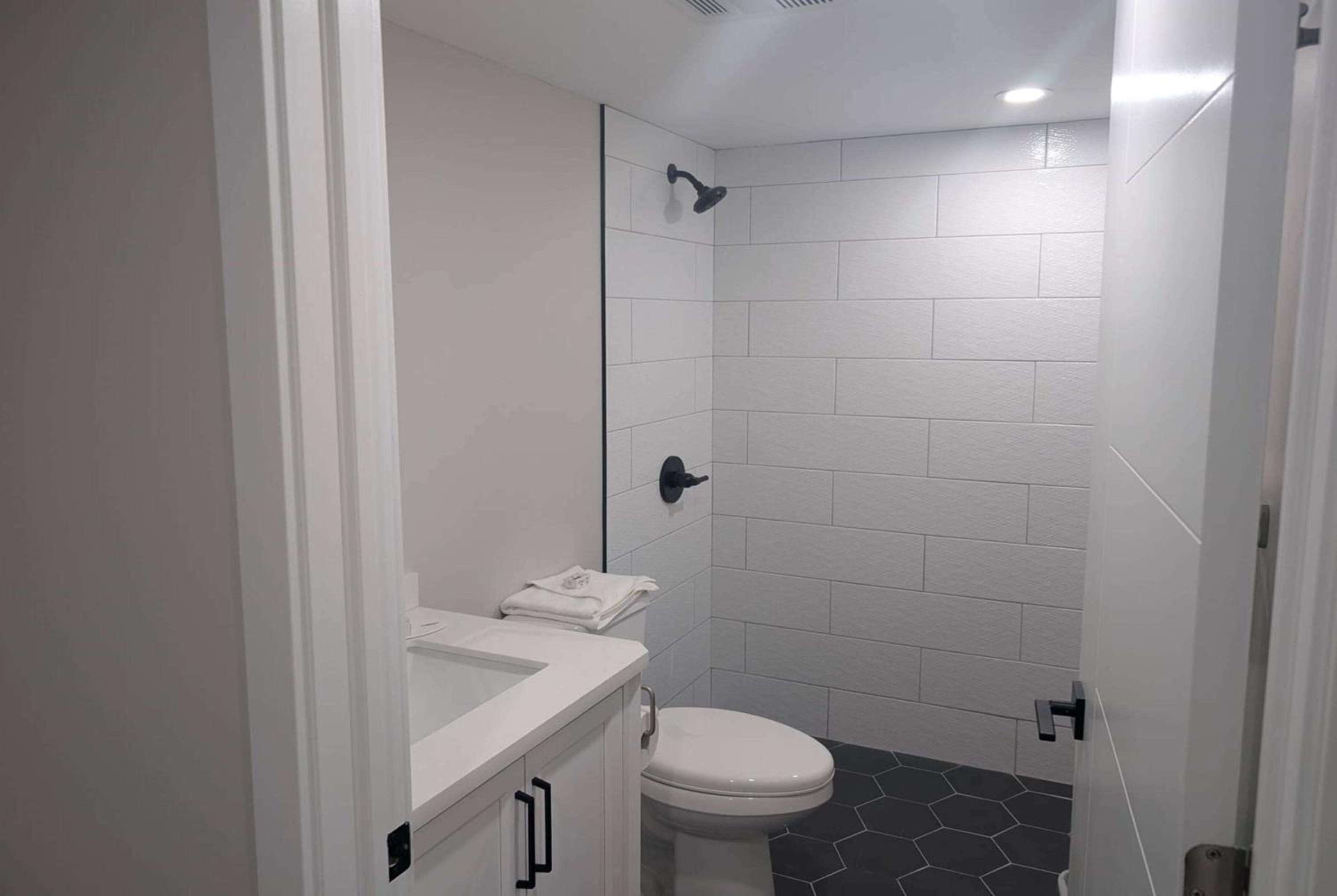 Suite with One Queen Bed and Kitchenette - Roll-In Shower - Non-Smoking - Photo 2