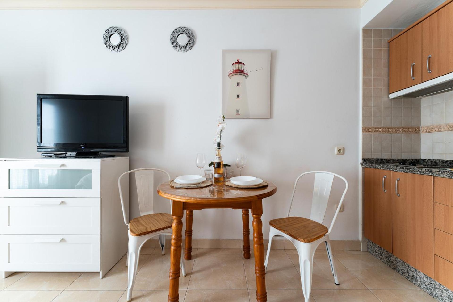 Apartment with Balcony - Photo 2