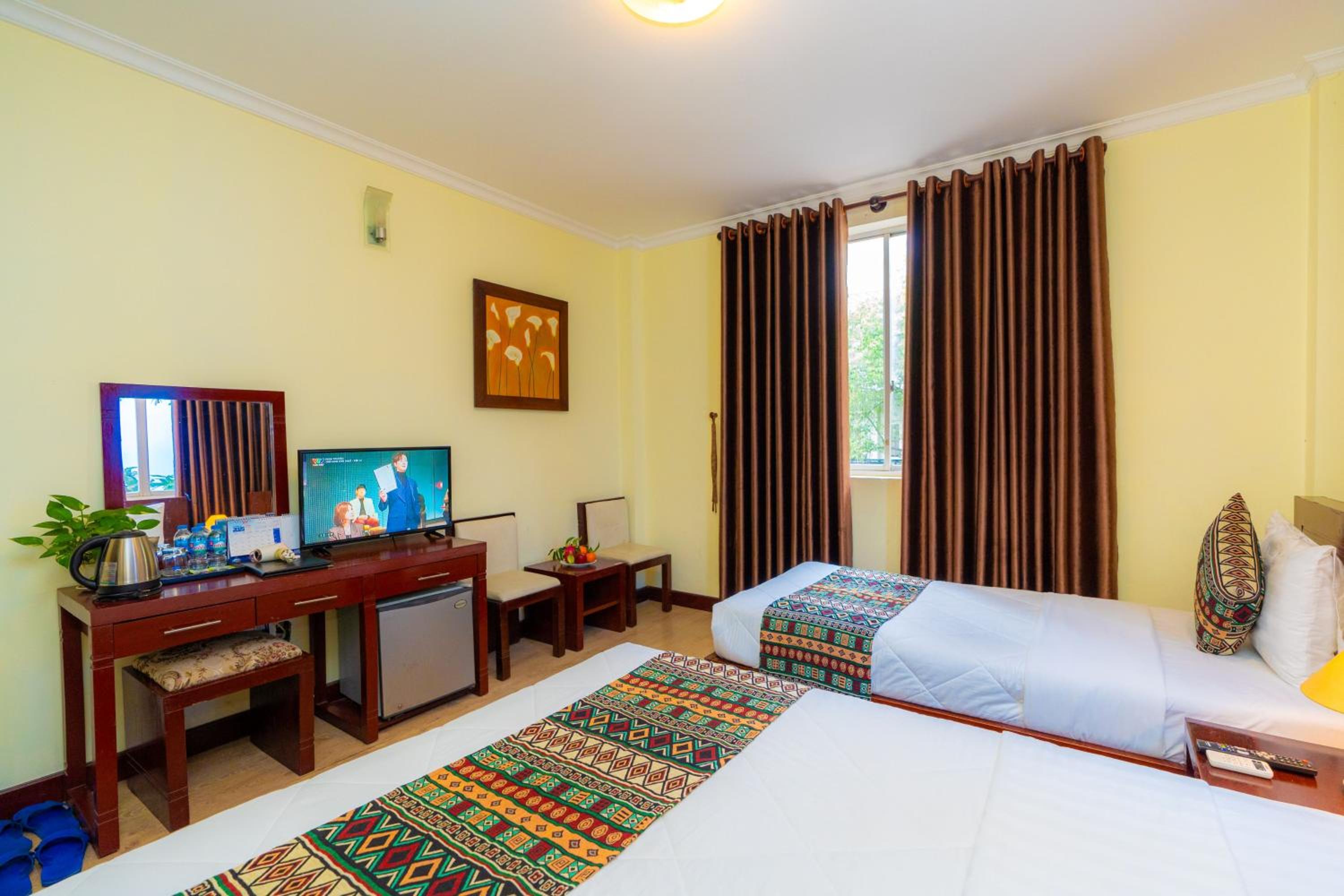 Deluxe Triple Room