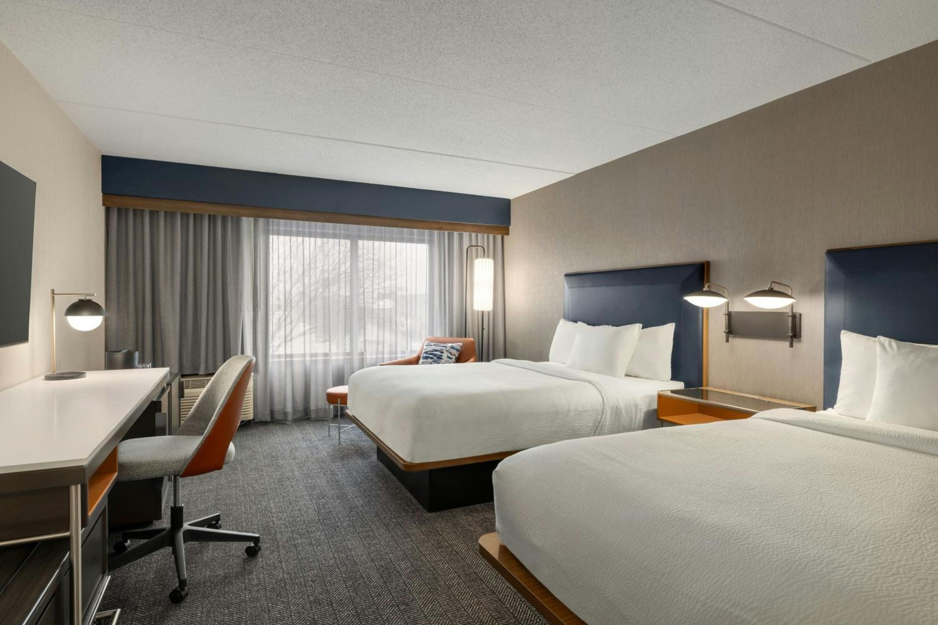 Queen Room with Two Queen Beds - Photo 1