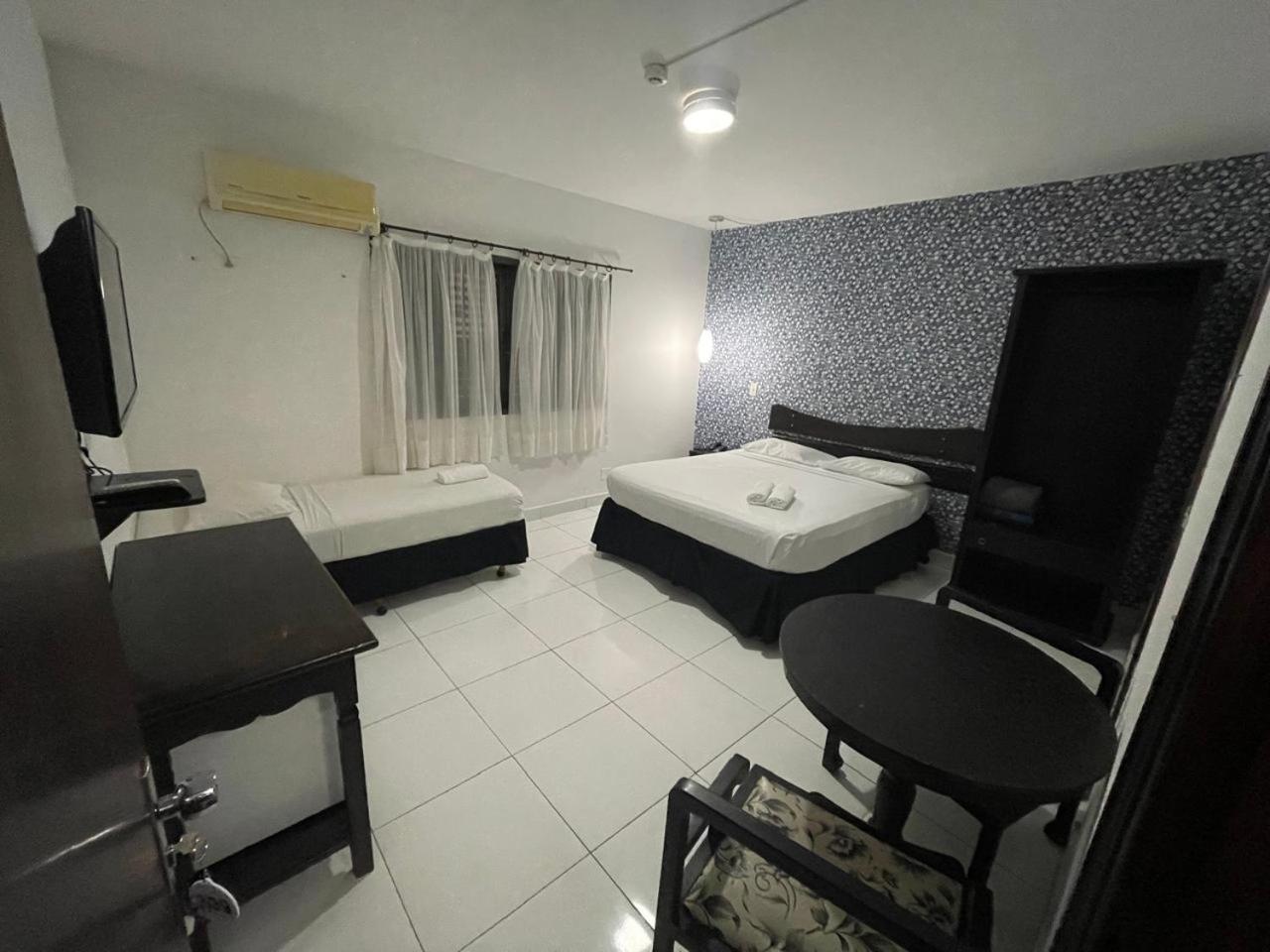 CR Hotel Bueno — Executive Triple Room