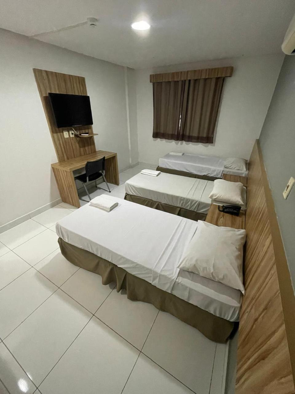 CR Hotel Bueno — Deluxe Triple Room