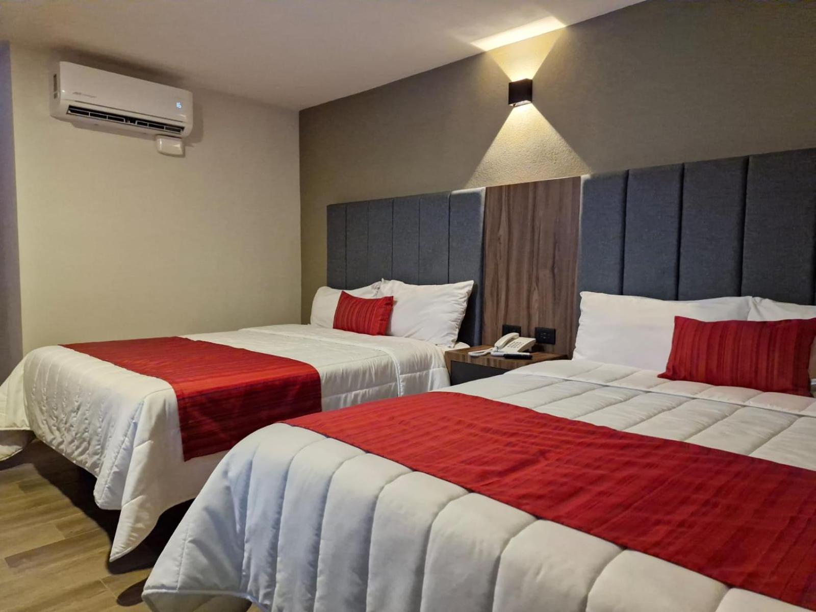 Deluxe Queen Room with Two Queen Beds photo 2