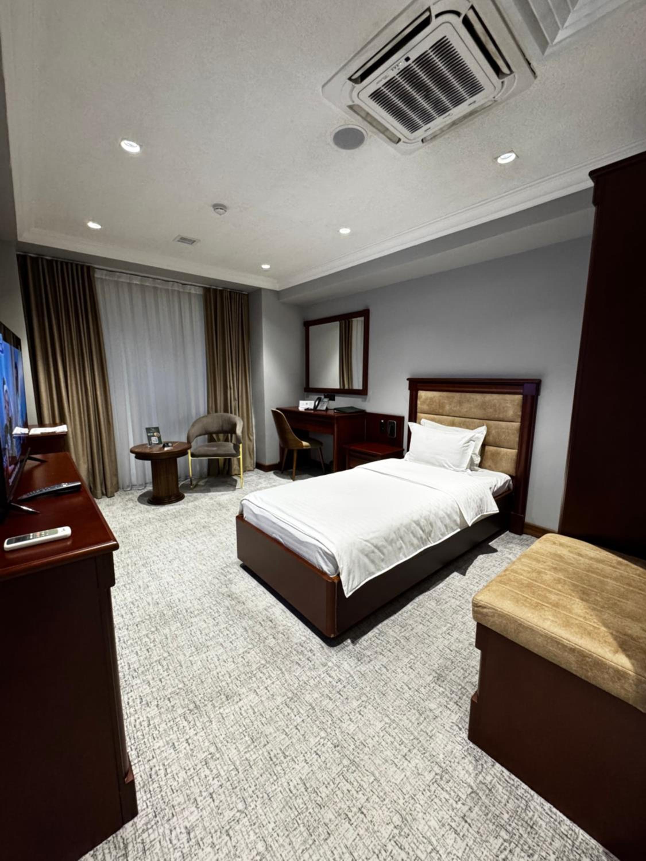 Budget Single Room - Photo 1