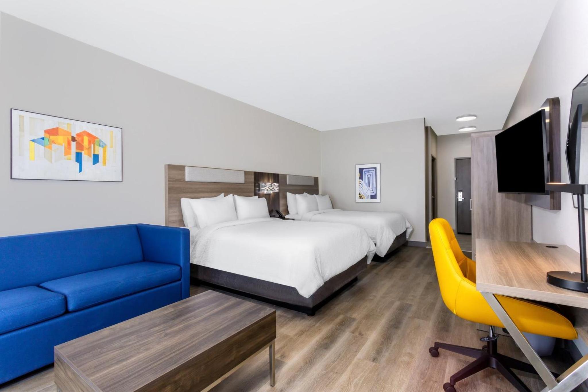 Queen Suite with Two Queen Beds and Sofa Bed