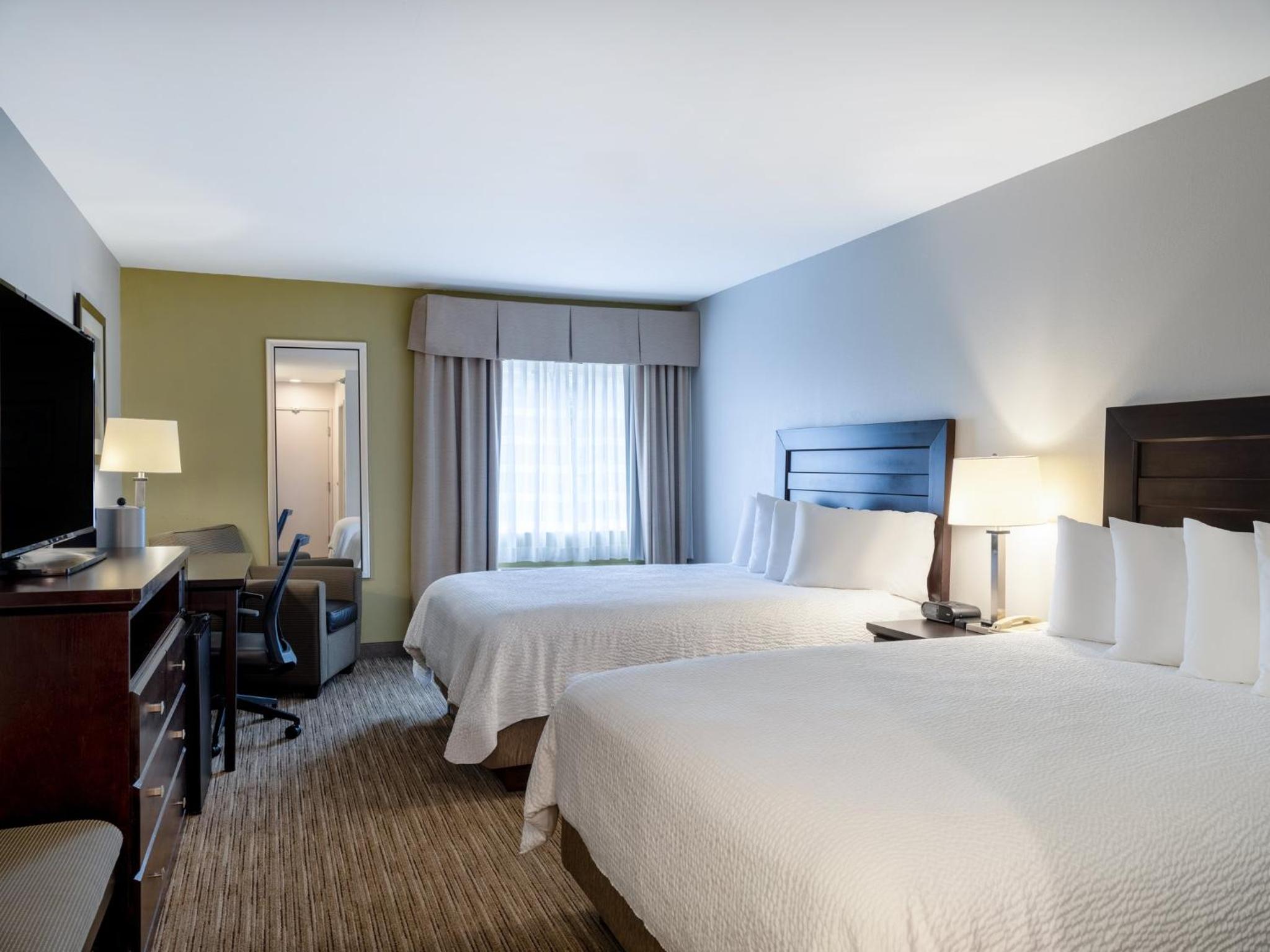Queen Suite with Two Queen Beds and Mobility Accessible Roll-In Shower - Photo 1
