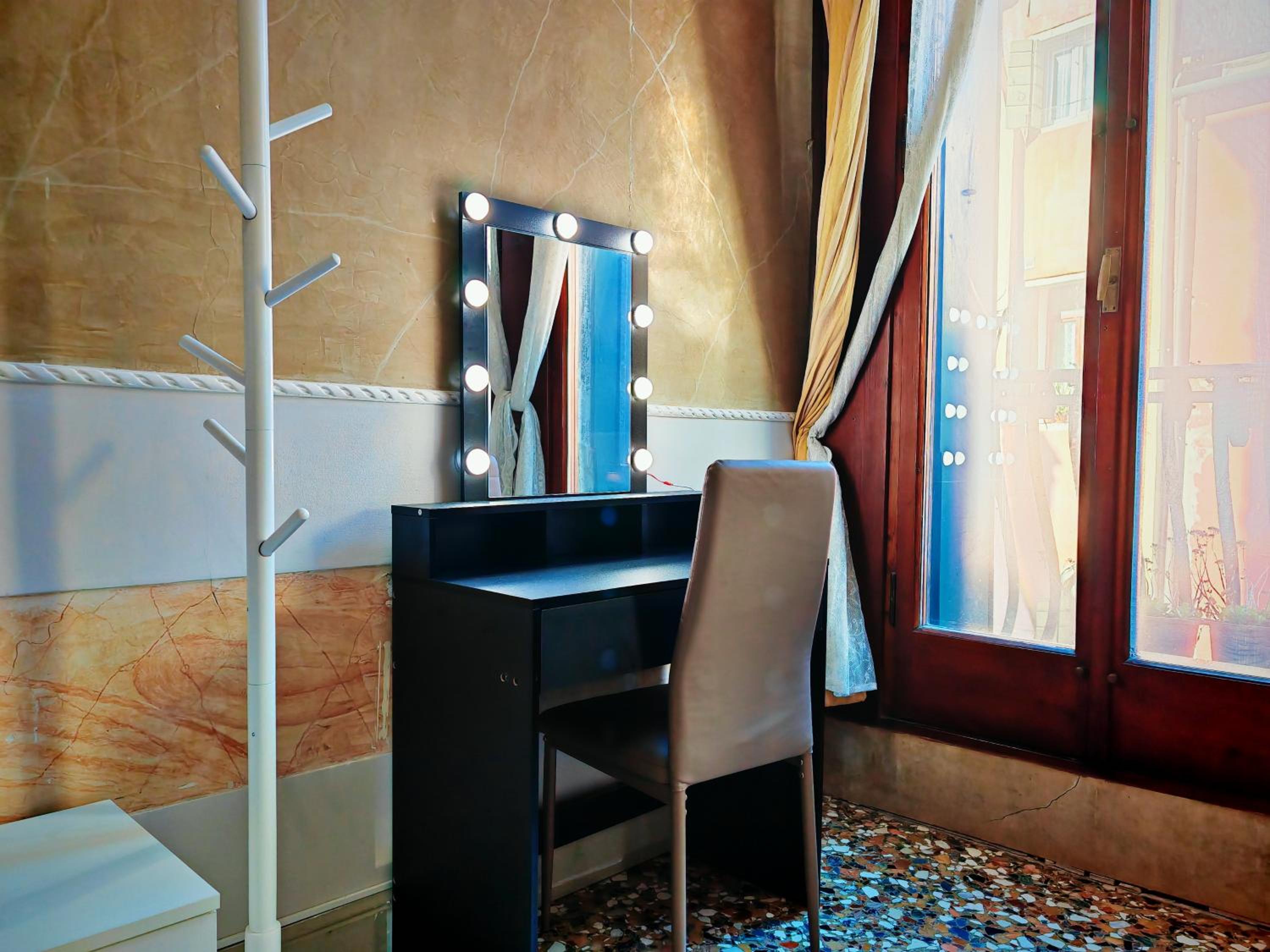 Camera Tripla con bagno condiviso