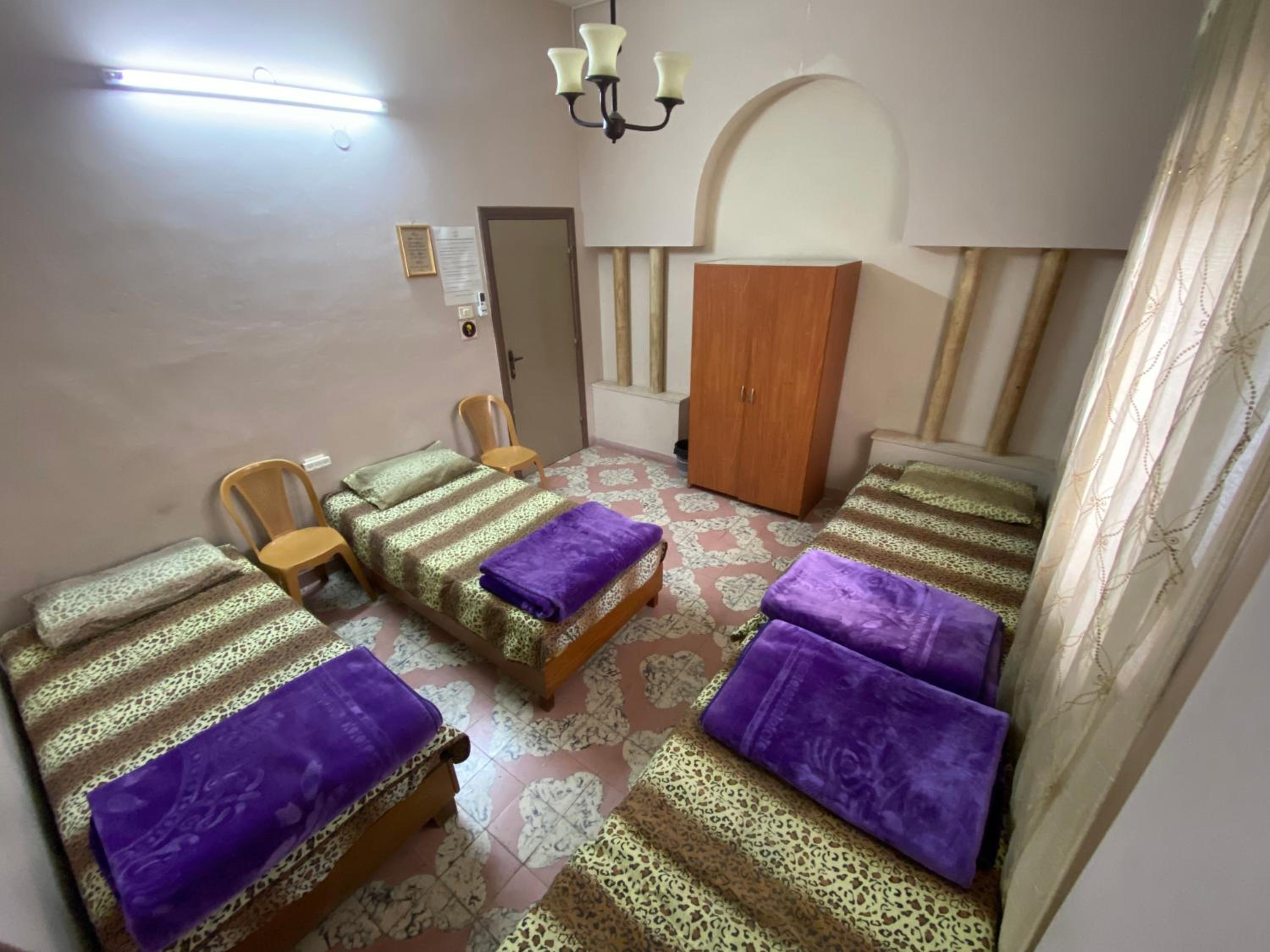 Single Bed in Male Dormitory Room