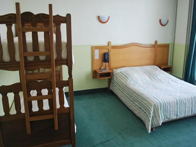 Quadruple Room (2 Adults + 2 Children) photo 2