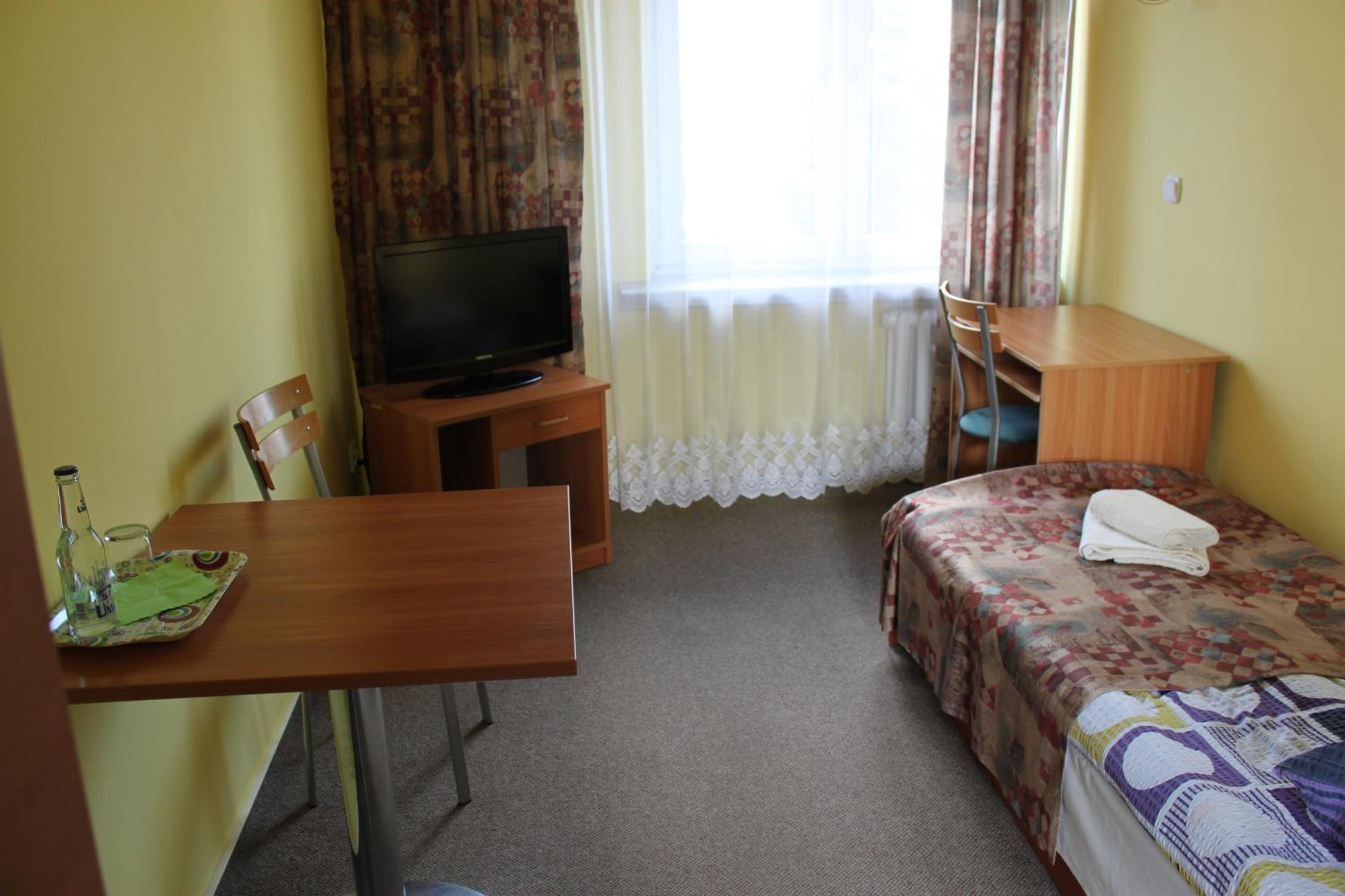 Basic Single Room with Shared Bathroom photo 1