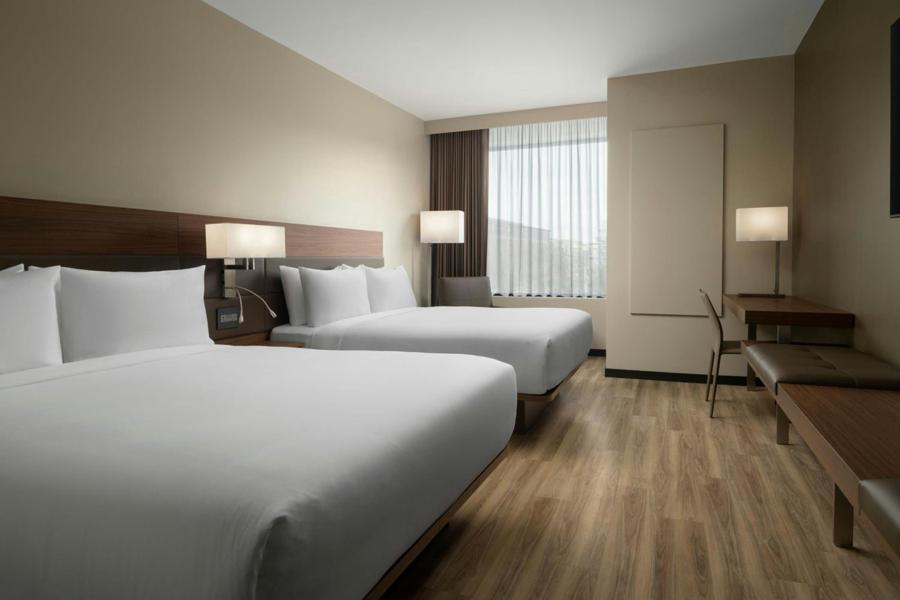 Standard Queen Room with Two Queen Beds - Photo 1