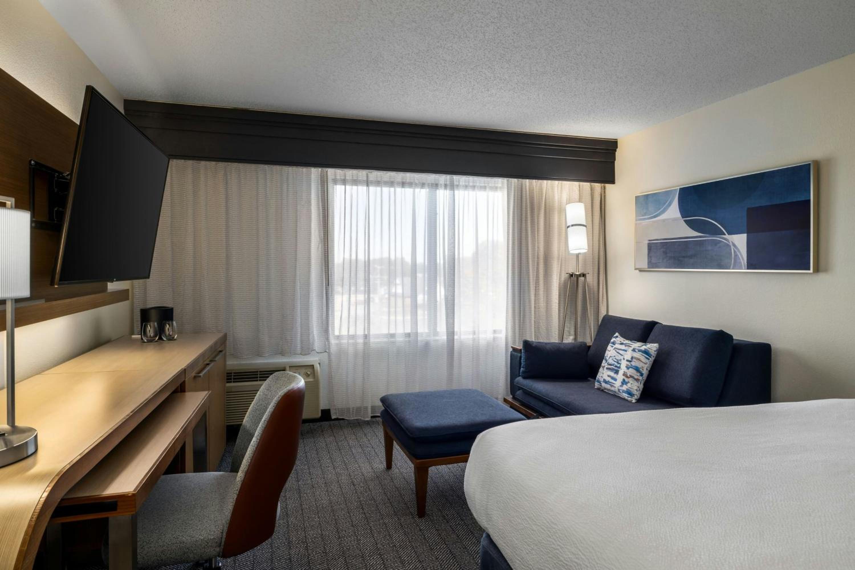 King Room with Sofa Bed and Roll-in Shower - Mobility and Hearing Accessible - Photo 4