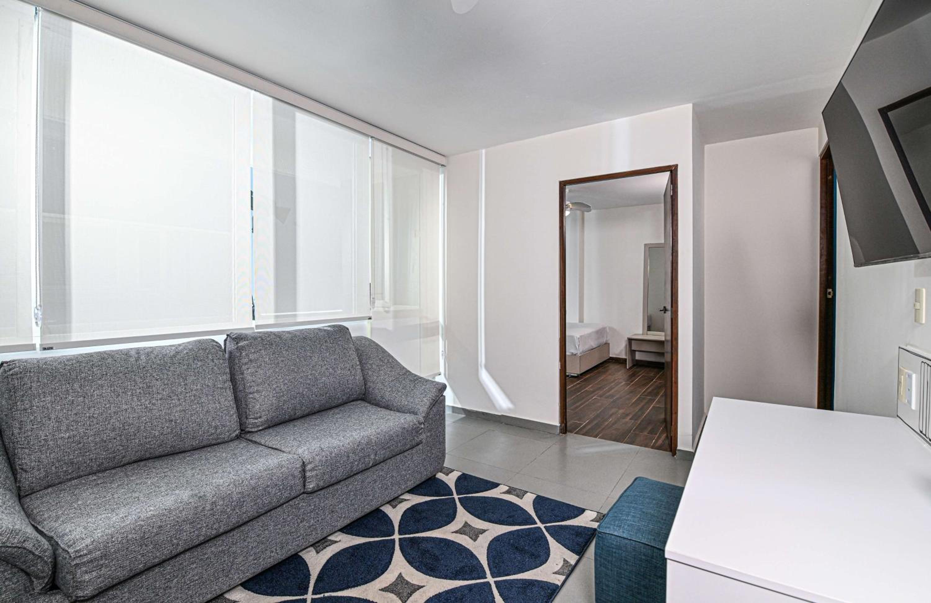 Suite with Two Double Beds and Sofa Bed - Non-Smoking