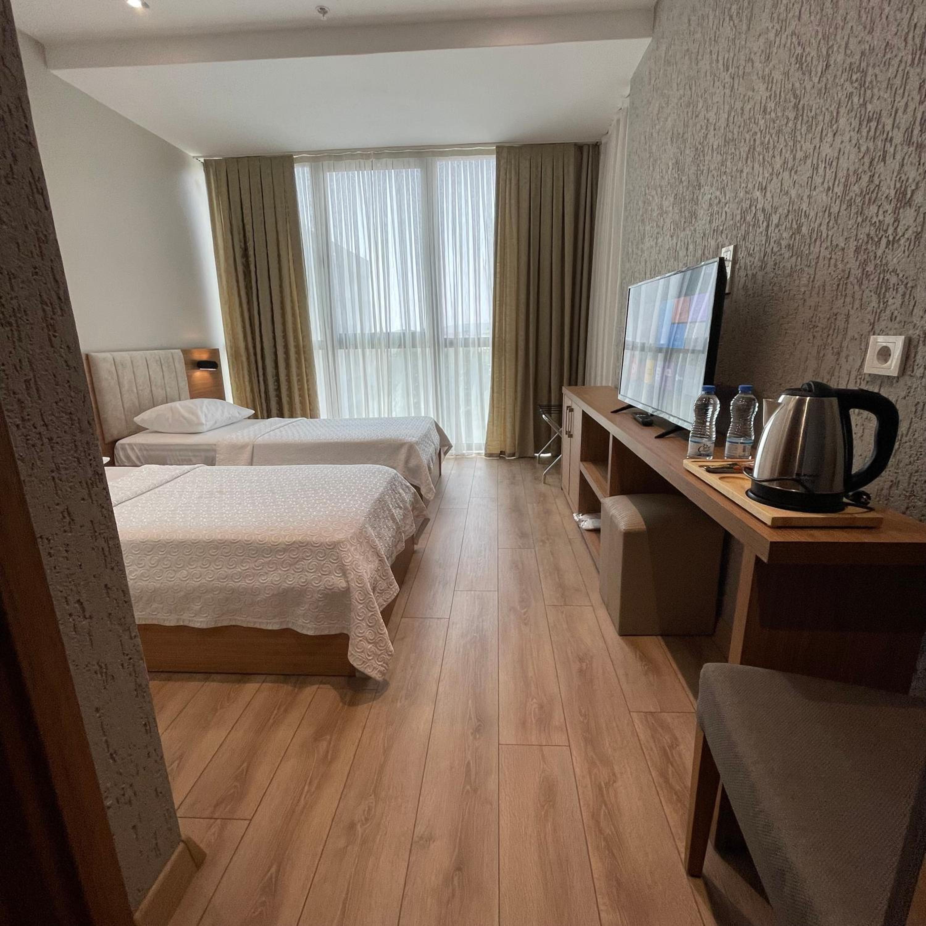 Standard Twin Room - Photo 6