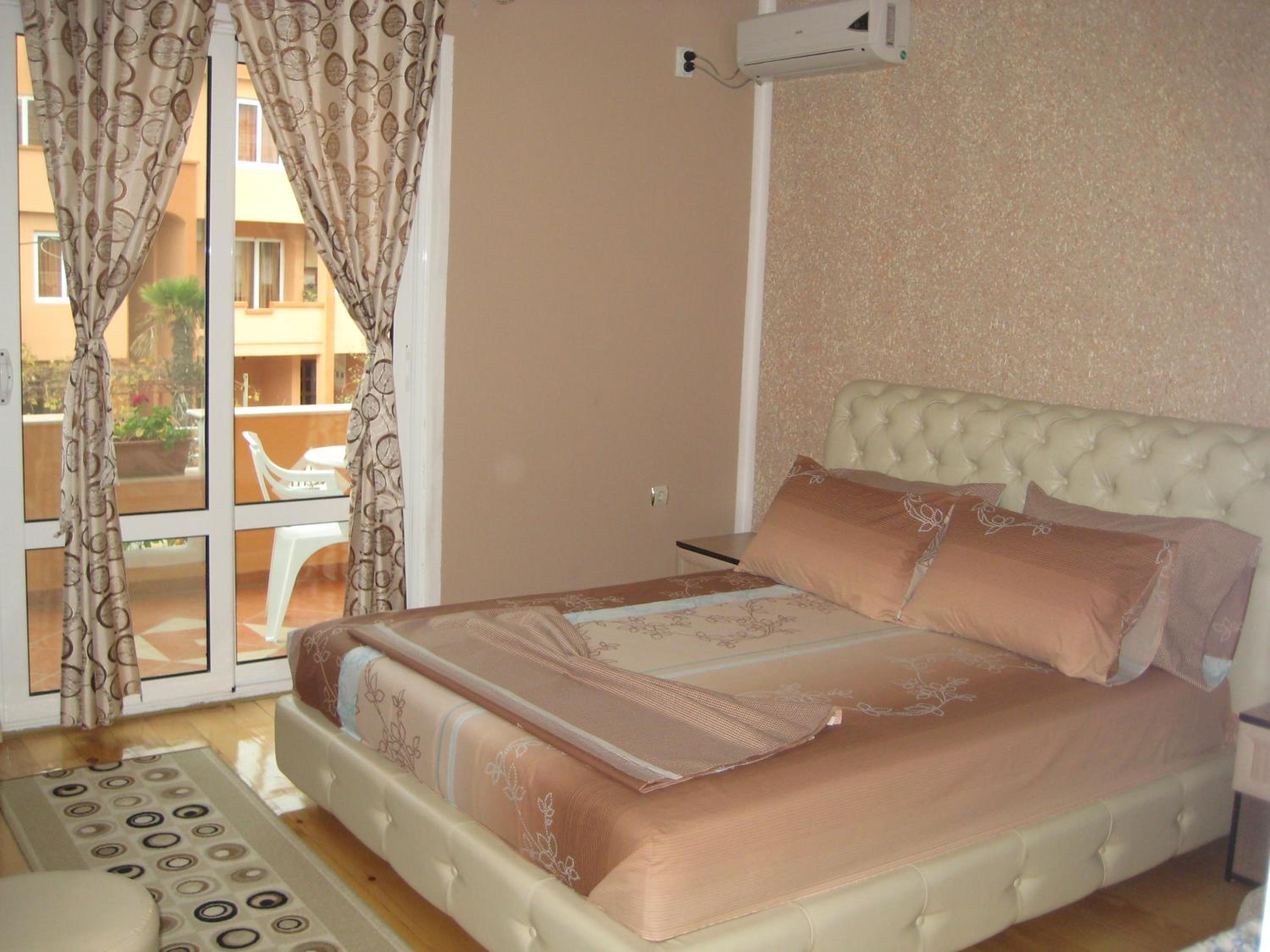 Two-Bedroom Apartment with Balcony