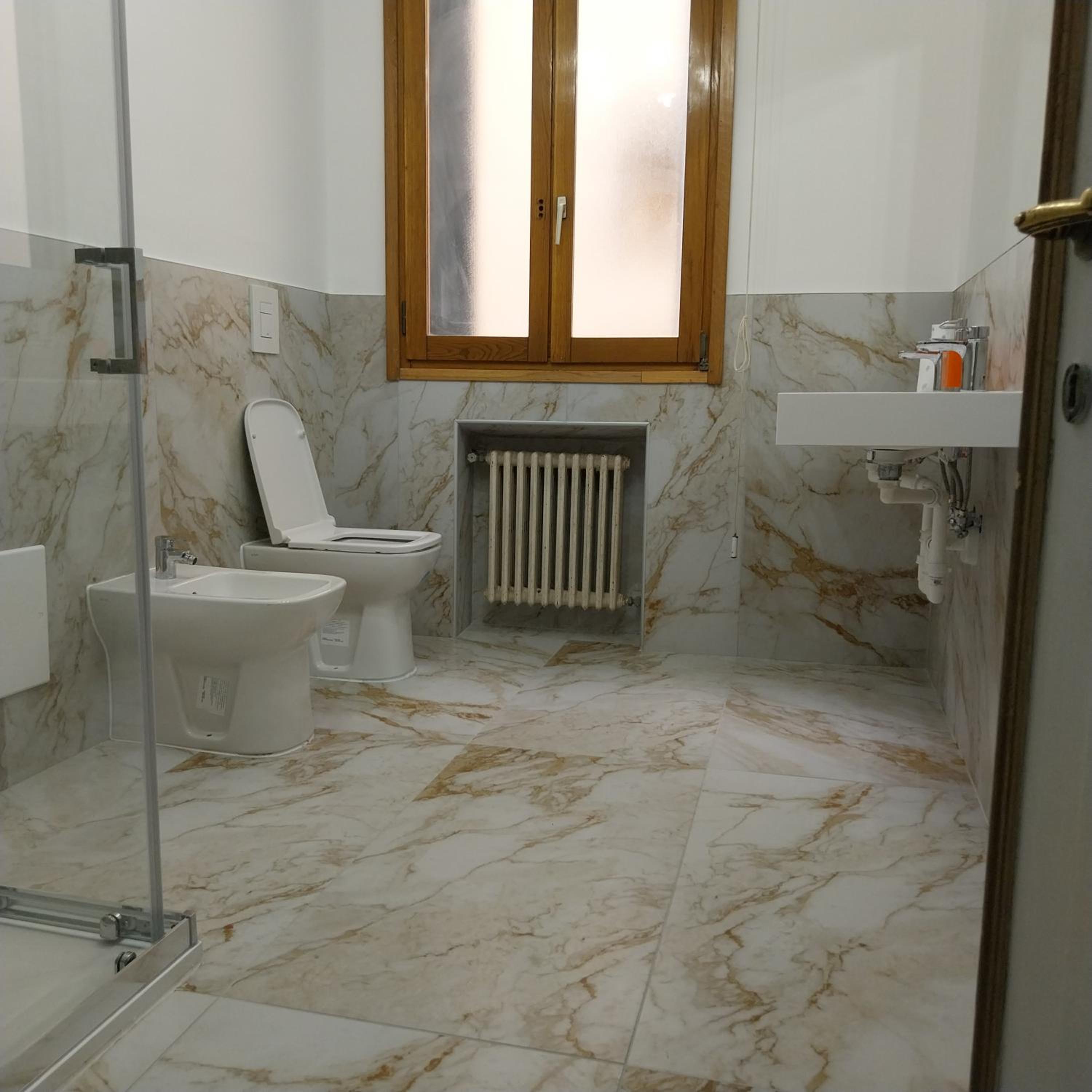 Quadruple Room with Private Bathroom photo 2