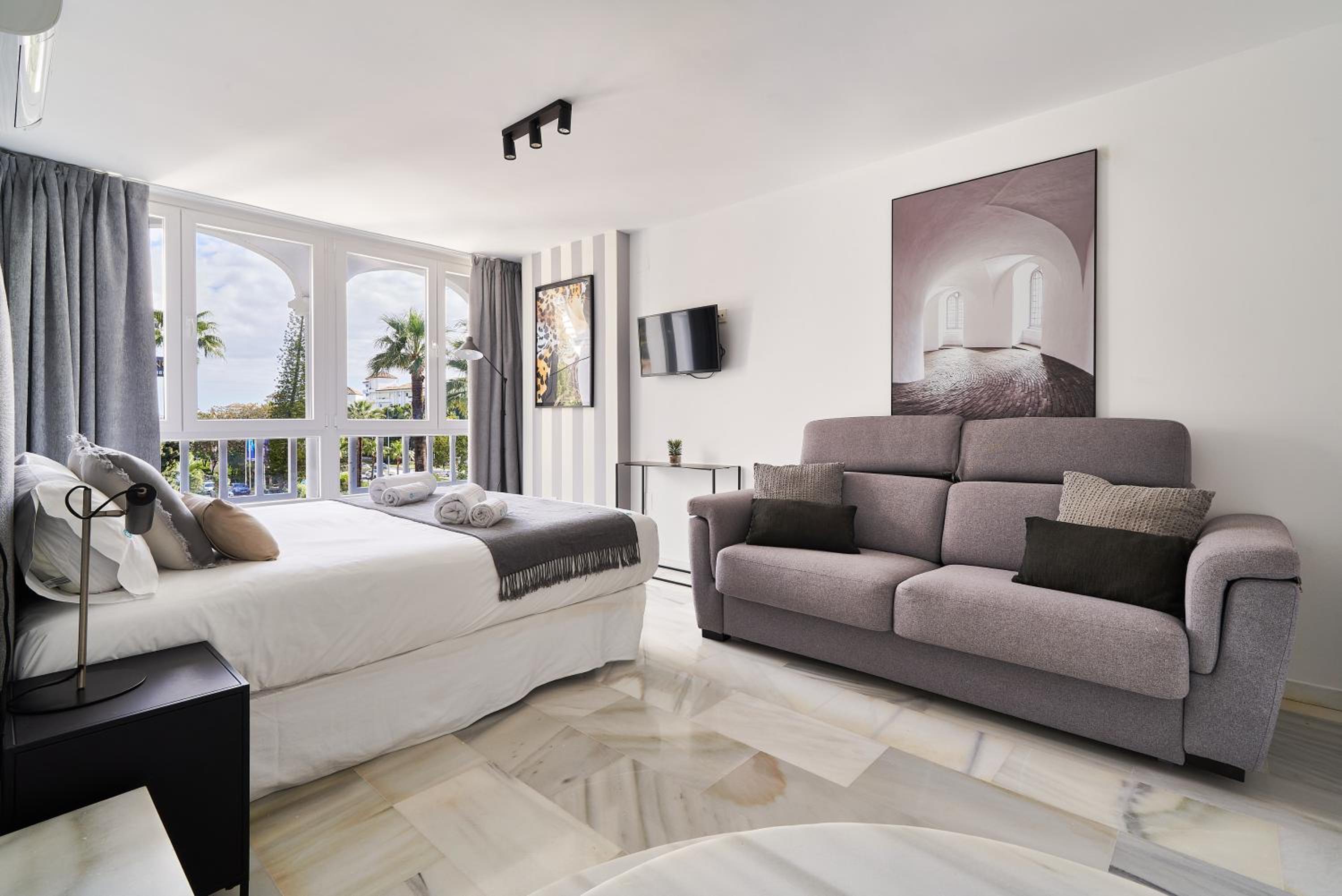 One-Bedroom Apartment with Balcony and City View