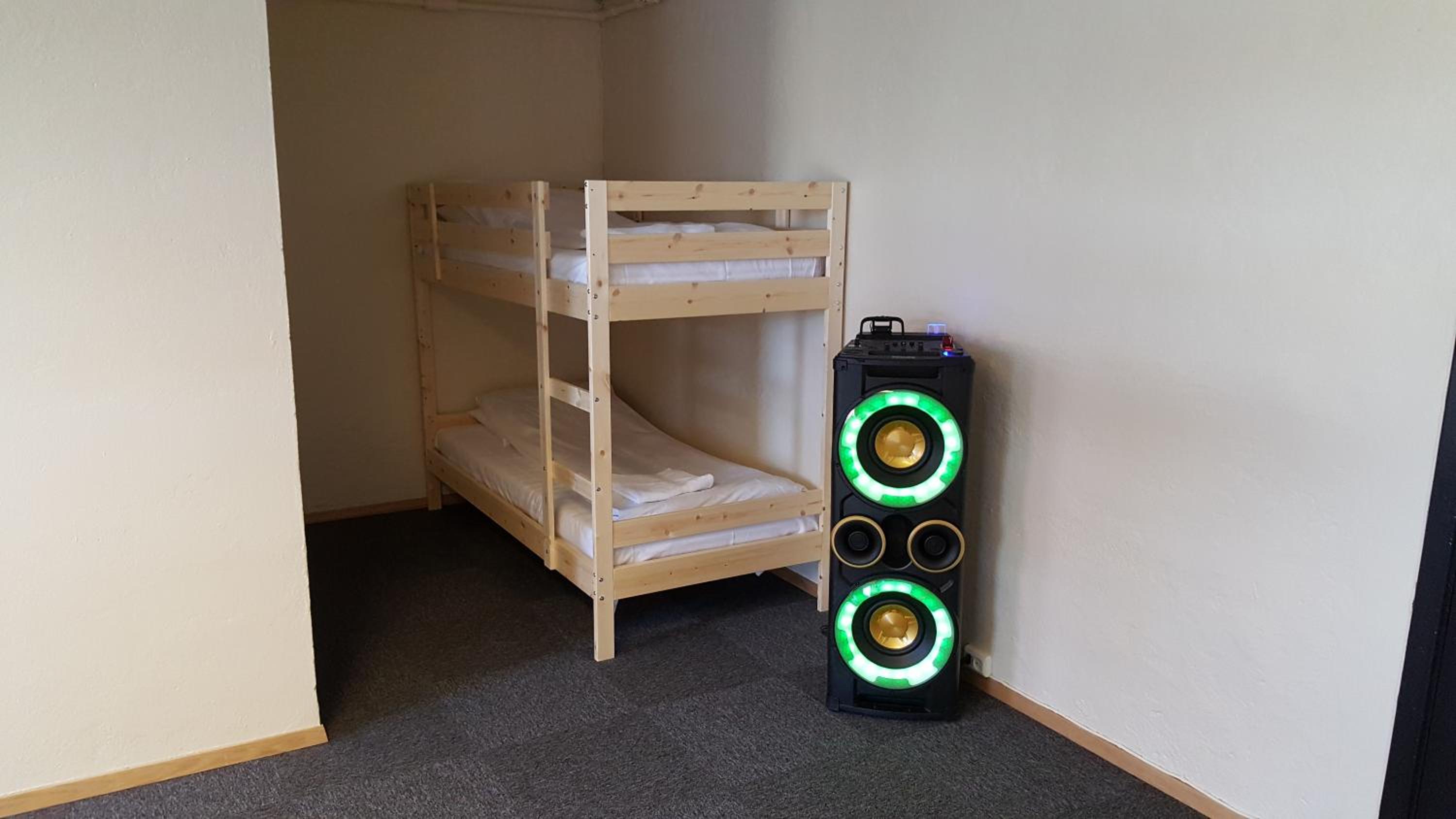 Single Bed in Dormitory Room