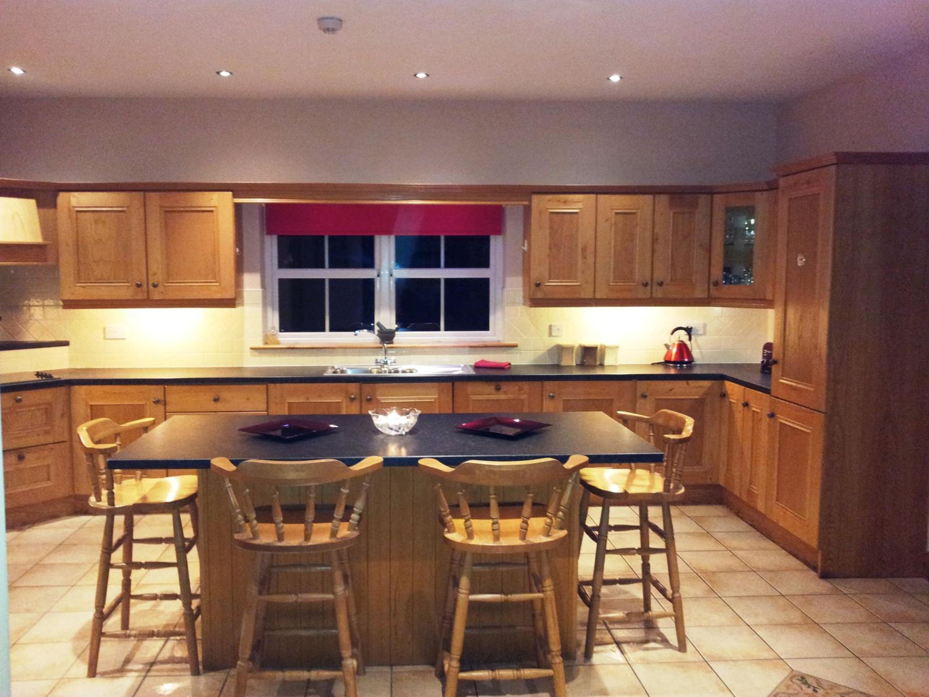 Three-Bedroom House - Photo 28