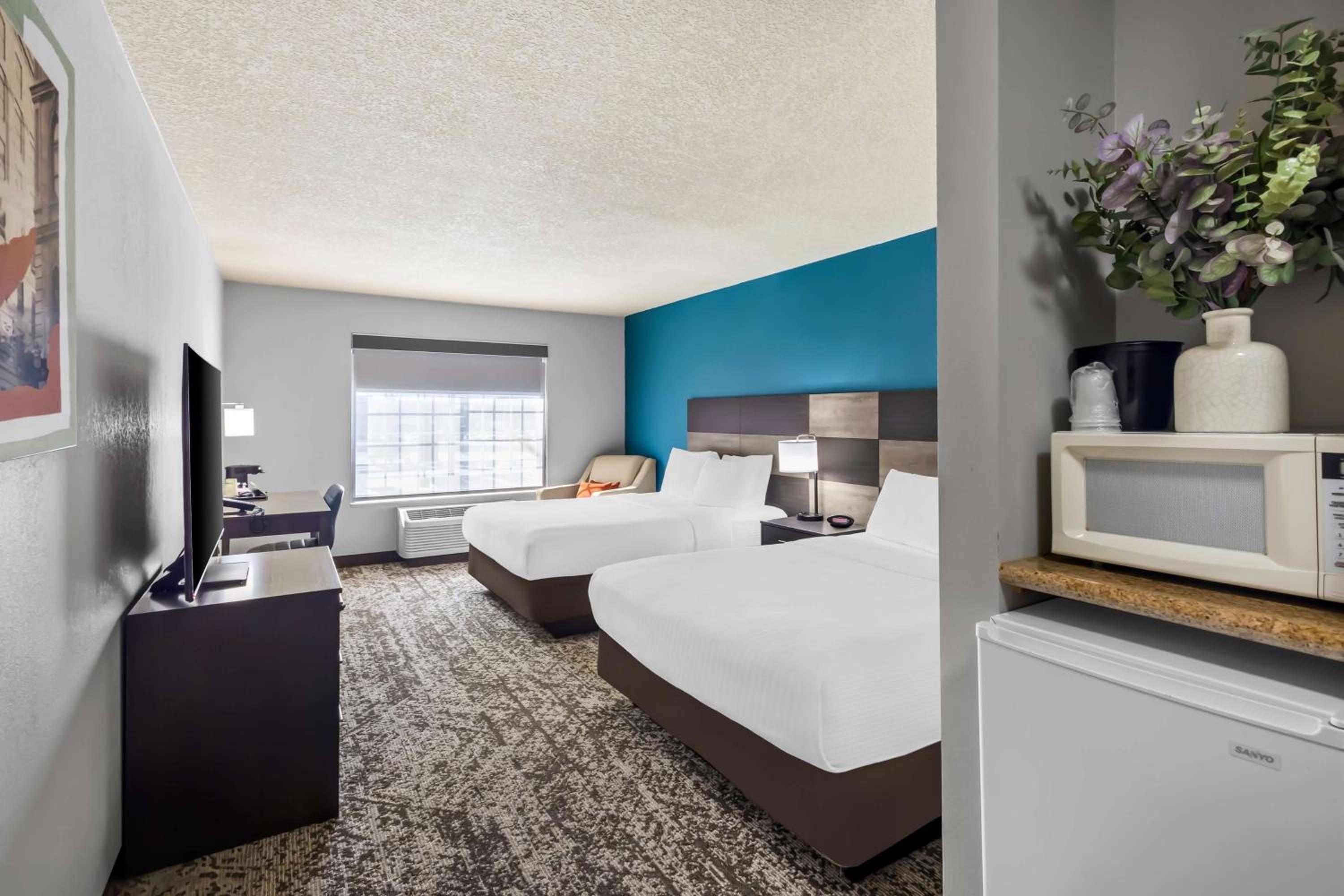 Queen Room with Two Queen Beds - Pet Friendly/Non-Smoking - Photo 1