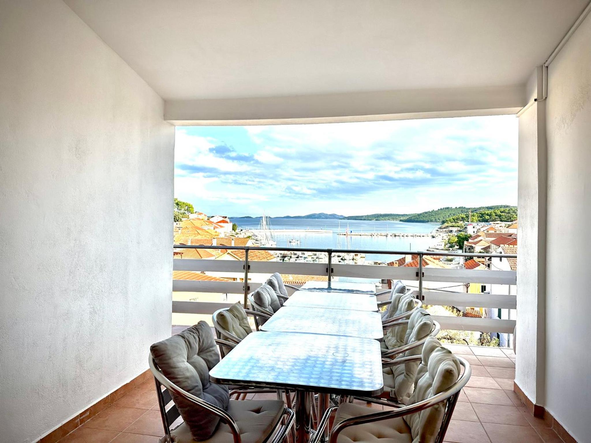Three-Bedroom Apartment with Harbor View