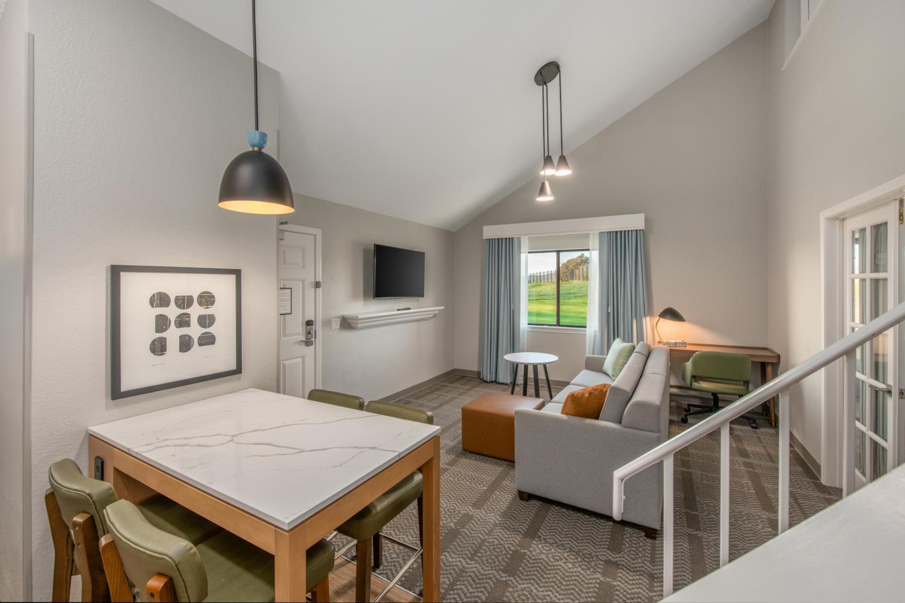 Bi Level Queen Suite with Two Queen Beds and Loft - Golf View
