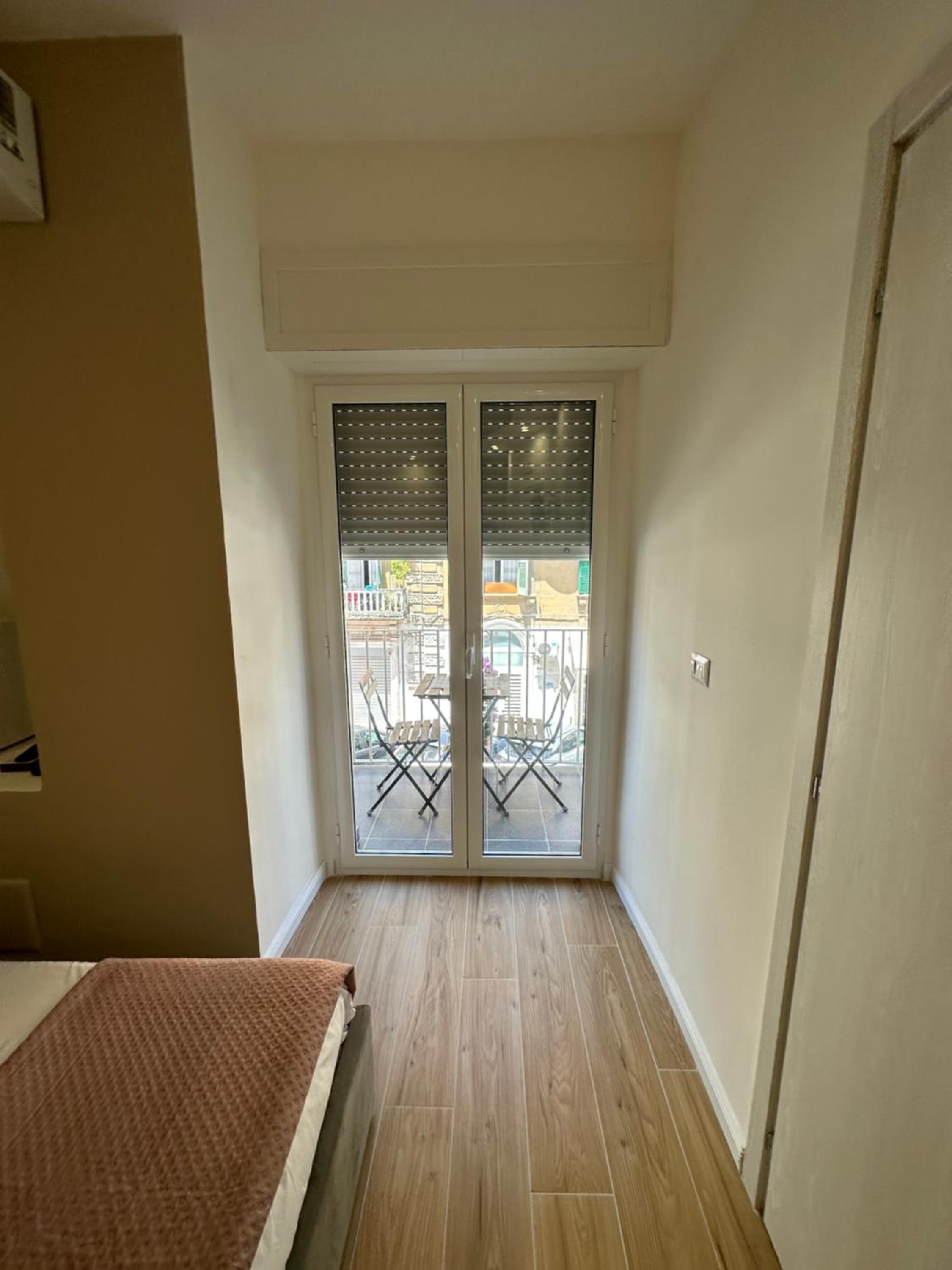 Quadruple Room with Balcony