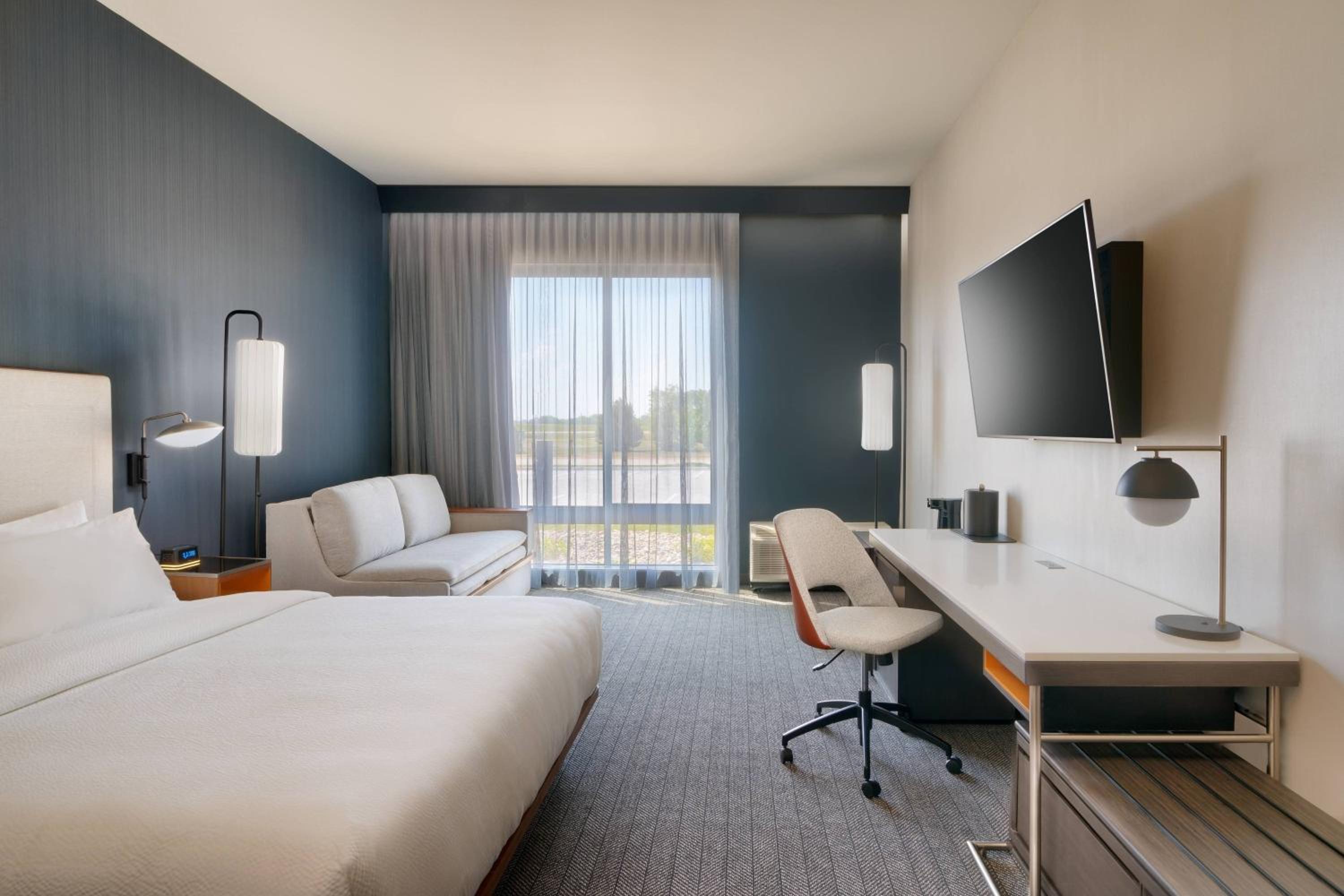 One-Bedroom King Suite with Roll-In Shower and Sofa Bed - Mobility Access/Hearing Accessible