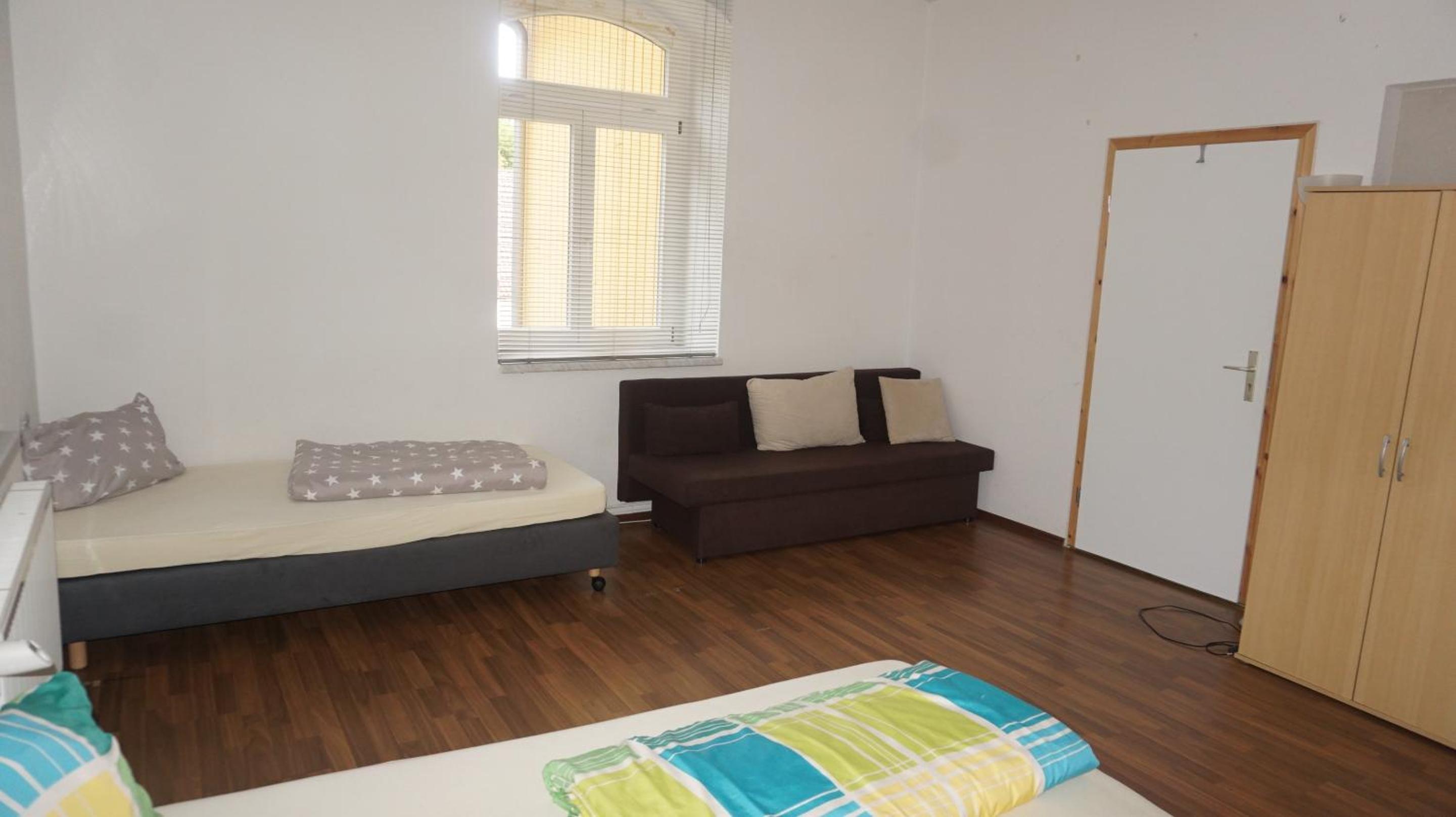Basic Triple Room with Shared Bathroom photo 3